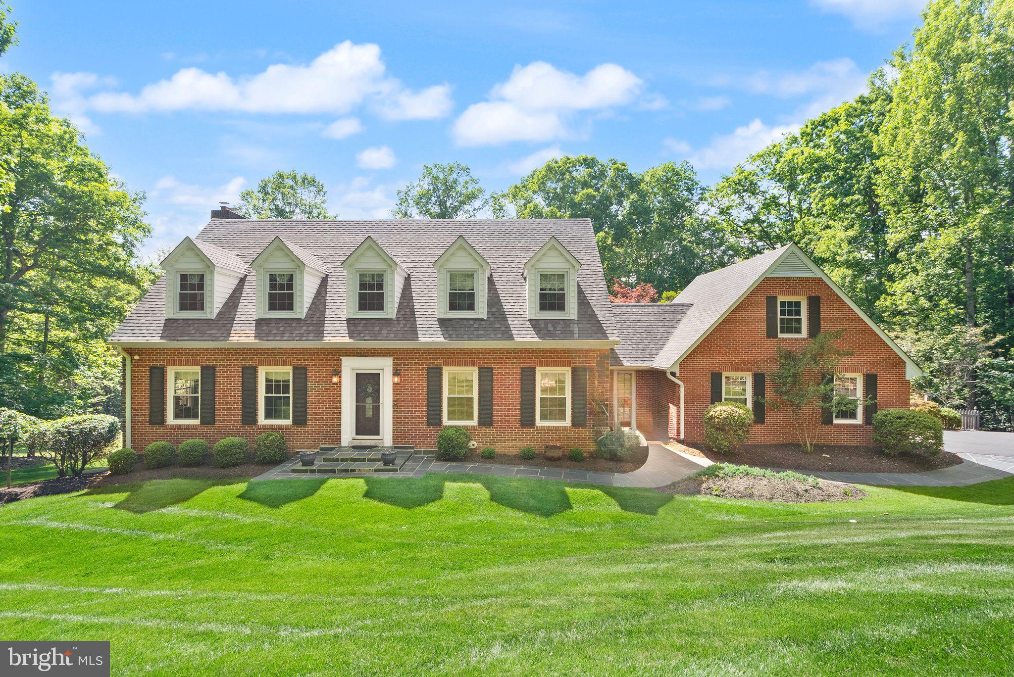 Nestled on 5 private acres in the sought after Occoquan Overlook community, this stunning 4 brick sided property offers the perfect blend of space, comfort, and resort-style living. Inside, you’ll find beautiful wood floors throughout the main level and a thoughtfully designed layout featuring 4 bedrooms and 3.5 baths, and a traditional dining room, living room, and family room floor plan. The kitchen is a chef’s dream with granite countertops, stainless steel appliances, double wall ovens, and a large pantry for ample storage. Expansive living areas provide both functionality and warmth throughout the home. Upstairs includes a spacious primary suite with a private full bath featuring dual sinks and a walk in tile shower. Two additional large bedrooms and another full bath are located upstairs. The finished basement provides a fourth bedroom, full bath, living area and a second kitchen—ideal for multi-generational living, guests, or entertaining.

Step outside to your own private retreat featuring an incredible in-ground pool surrounded by extensive landscaping for year-round enjoyment and privacy. Enjoy the view from the large deck accessed from the kitchen, family room, garage or driveway. The large rear yard offers endless possibilities for recreation, gardening, or simply relaxing in a peaceful setting.

Major updates include a new roof in 2026 and three HVAC systems replaced in 2021, with one dedicated unit for each floor for maximum comfort and efficiency. Entire septic system replaced in 2020

This rare property combines acreage, luxury amenities, and versatile living space in one exceptional package.