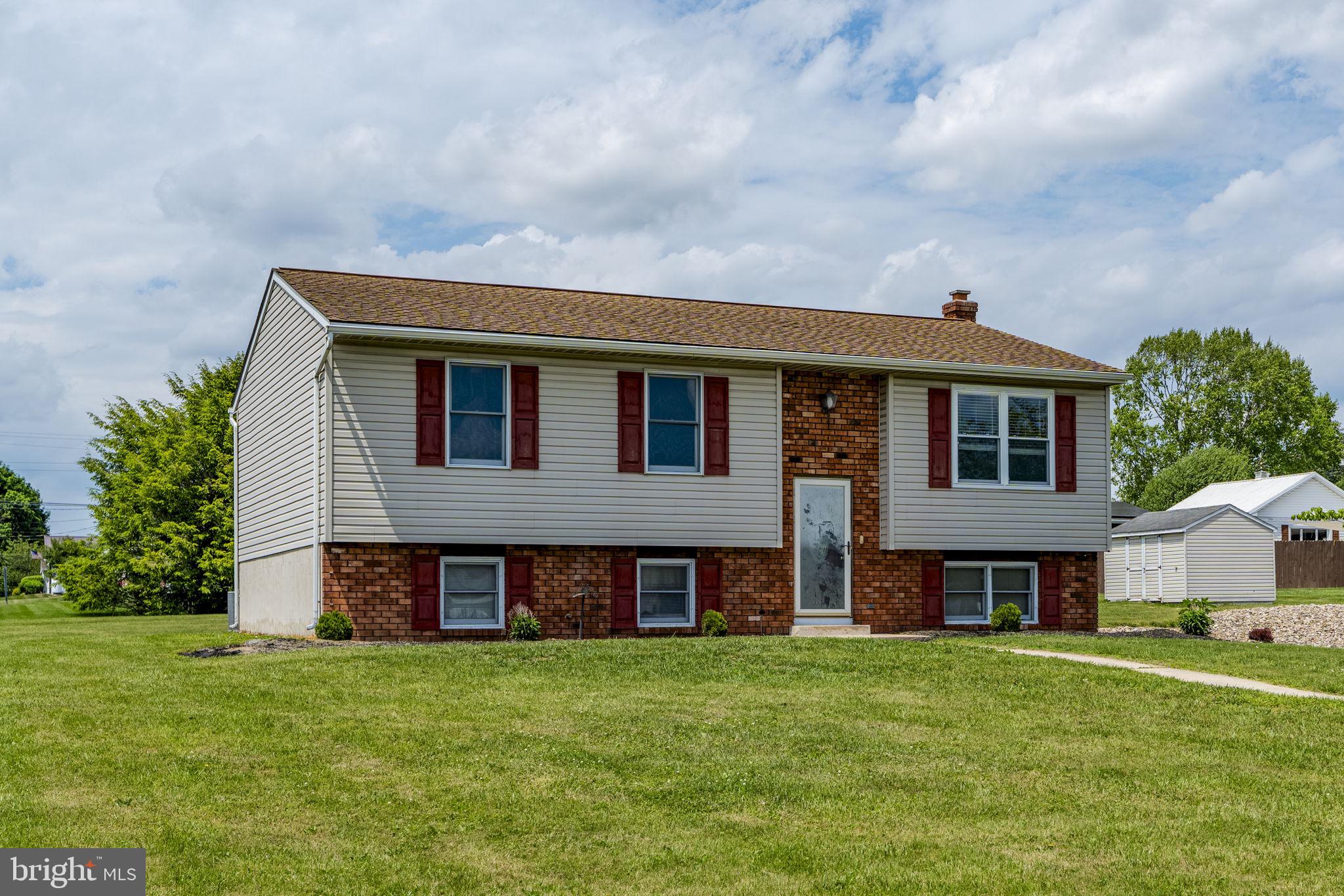 AUCTION PROPERTY.  AUCTION DATE – SATURDAY, August 15th @ 1PM.   List price is opening bid only and is not indicative of the final sale price. Property must go to auction. TERMS:  10% down day of auction, balance 60 days or before.  Buyer pays both transfer taxes (2% of sale price).  REAL ESTATE: Brick/vinyl split foyer house w/2108 SF finished area, eat-in kitchen w/oak cabinets & appliances, living room, family room, 3 bedrooms, full bath, 2 half baths, 12X9 bonus room & 12X10 bonus room w/cabinets, electric BB heat & central AC. House is very low maintenance w/covered soffit, fascia, 8 macadam parking spaces & utility building on ½ ACRE m/l lot w/public water & sewer. Ideal as residence or investment. ZONED COMMERCIAL. NOTE:  After 26 years, owners relocating to Open Door Baptist Church in Lebanon & serious to sell.  Convenient location.  Minutes to Lebanon, Womelsdorf & Reistville.  Economical & low maintenance.  OPEN HOUSE DATES: Saturday, July 25, August 1 & 8 from 1 to 4PM.
