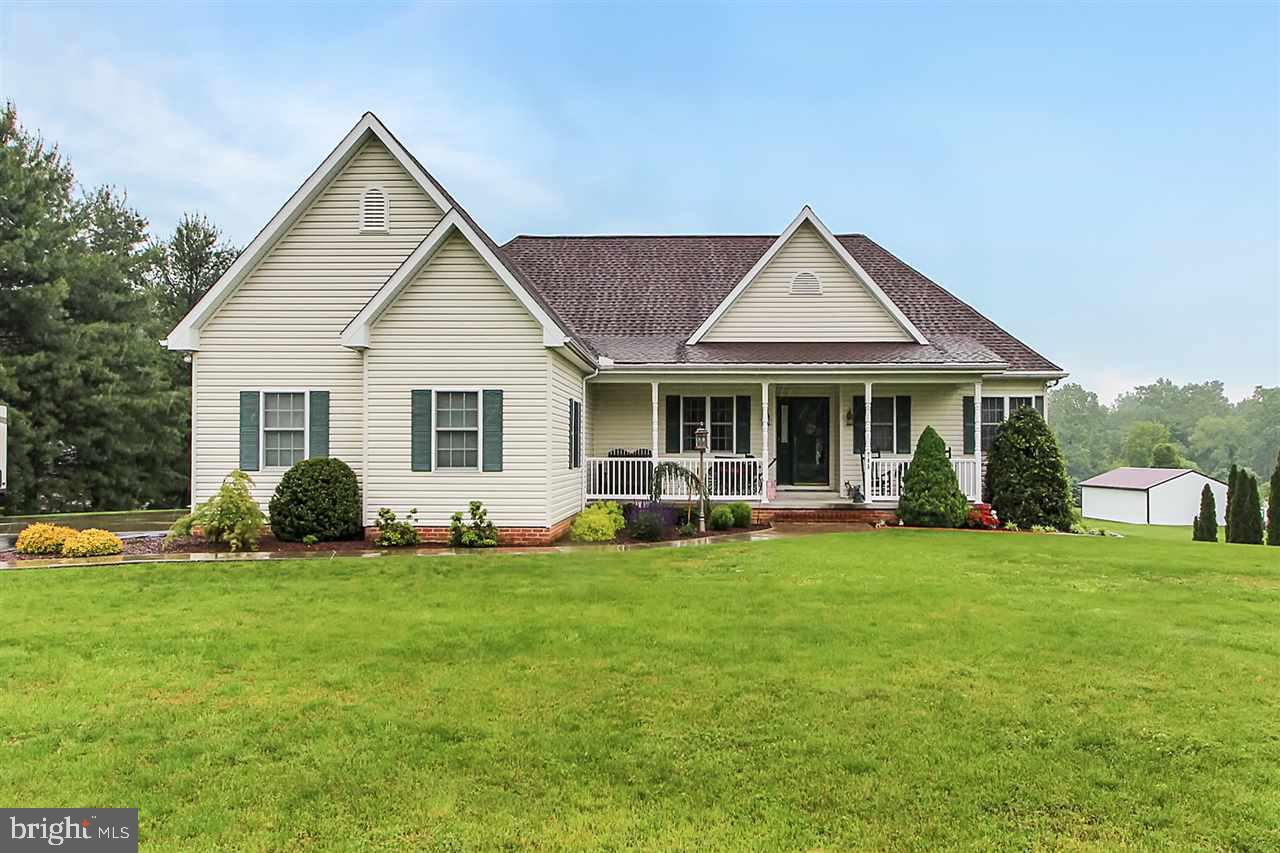 This home is in impeccable condition.  Don't miss this opportunity! (2) Master bedroom suites, open floor plan w/deck to access overlooking pristine in ground pool. Property located in delightful rural setting, adjacent to Beech Springs Farm Destination Wedding property.