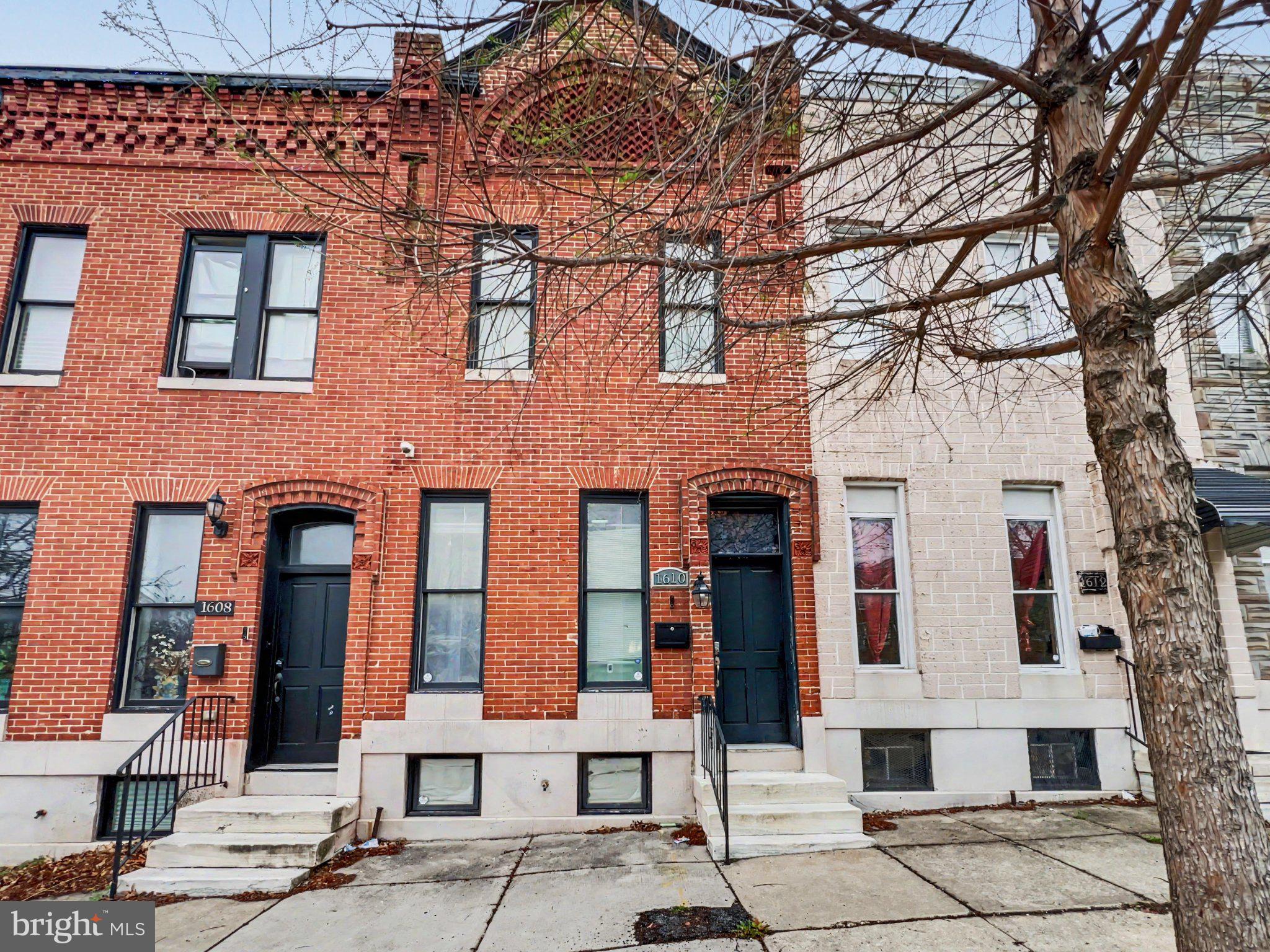 Welcome to 1610 N Broadway—an updated, move-in-ready Baltimore townhome that checks all the boxes. Featuring 2 bedrooms, 3 full bathrooms, and 1 half bath, this home offers an impressive amount of space and functionality throughout.
Step inside to a bright, open-concept main level with beautiful hardwood floors, recessed lighting, and a seamless flow from the living room into the dining area and kitchen—perfect for entertaining or everyday living. The kitchen offers ample cabinetry, modern finishes, and a layout designed for both convenience and style. Upstairs, you’ll find spacious bedrooms paired with well-appointed bathrooms, giving everyone their own space and comfort. The fully finished basement adds even more versatility with a large living area, full bathroom, and bonus room—ideal for a home office, gym, or additional flex space. Located just minutes from Johns Hopkins, major commuter routes, and local hotspots, this home combines comfort, space, and convenience in one package.