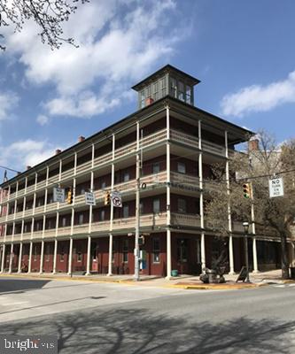 2 bedroom, 1 bath apartment in the Historic National House building. Living/dining room combo and kitchen with new appliances. Stackable washer/dryer and CAC. Unit also features a spectacular wrap around porch overlooking N. Beaver Street. Steps away from Central Market, restaurants and nightlife. No pets and no smoking indoors.