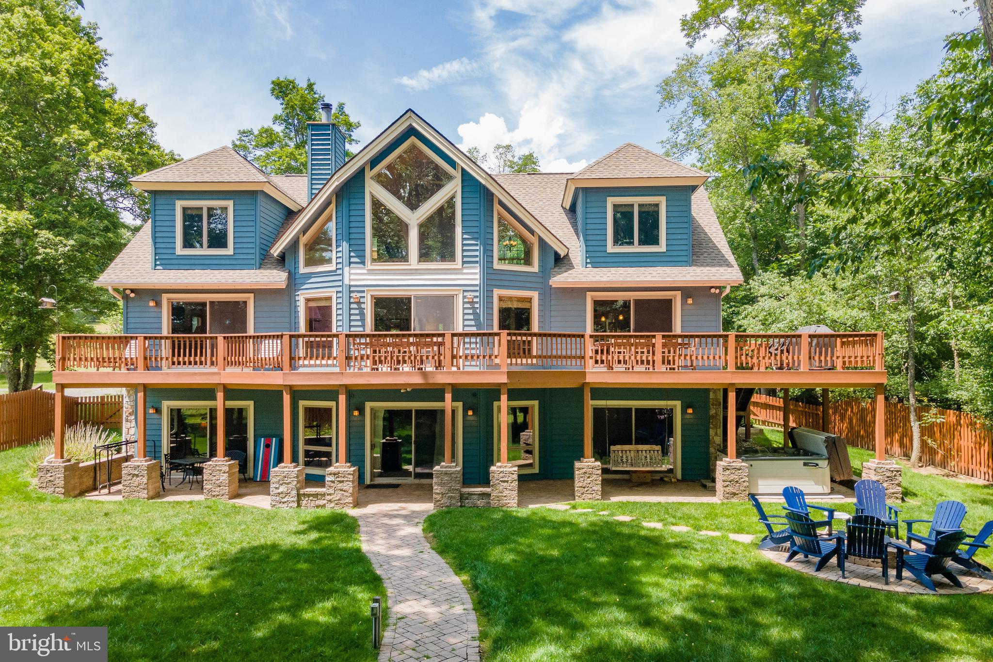 Gorgeous Lakefront Craftsman on Deep Creek Lake - This 7Bed 5.5Bath home has been meticulously maintained and is nestled on a private cove featuring a manicured level lakefront and personal Type A Dock! From the three bedroom suites, to the large deck overlooking the backyard with stunning lake views, you’ll find that this is the mountain lake getaway you’ve been looking for! All three levels are full of amenities for everyone. An Established Rental, “Paradise at Deep Creek” is located off the beaten path from any seasonal traffic, but still minutes from the best restaurants, state parks and Wisp Resort. Don’t miss out on this incredible opportunity.  Call today for details!