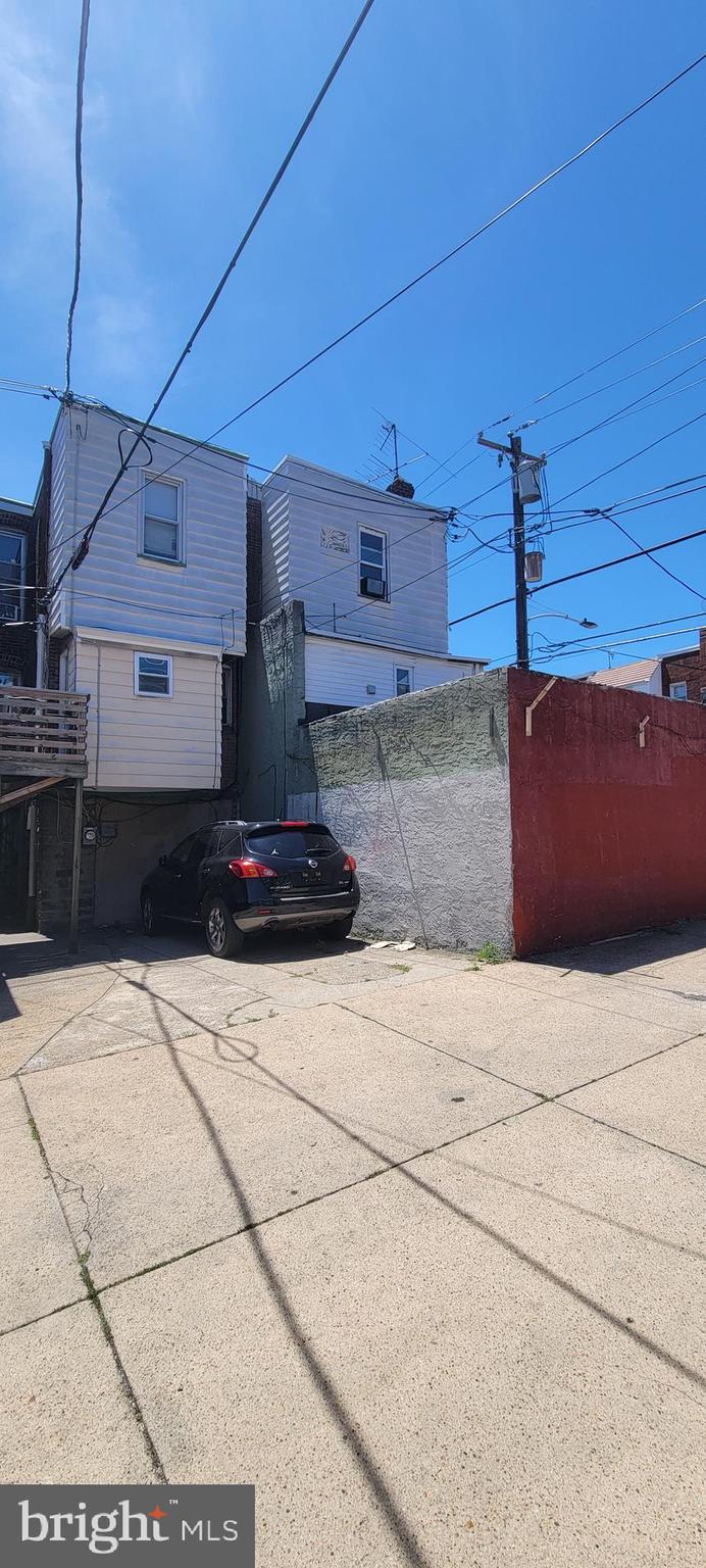 Attention all investors: the opportunity is knocking!
Do not miss this investment opportunity on the rather spacious mixed-use Corner Property in a great location of the desirable Oxford circle, steps away from local shops, restaurants, and public transportation with easy access to Roosevelt Blvd, Bustleton and Frankford Avenues. This property offers a versatile combination of commercial and residential spaces for a great investment opportunity. It offers a prominent street-level presence with potential built-in signs you can put there at the entrance and its strategic corner location on the intersection of two well-known streets to enhance business exposure.
This property consists of 2 attached residential single-family homes, and a mixed-use unit located in the basement which can serve a multiple variety of business such as but not limited to store-front, office space, storage facility, etc.
The 1501 E Cheltenham Ave: 2-leveled unit atop of a pharmacy offers a straight-through main level with enclosed porch, Living room, Dining area and a kitchen, the second floor contains 3 bedrooms, a full hallway bathroom with ceramic tile flooring. The home features wall to wall carpets, and a neutral décor.
The other residential unit, 1503 E Cheltenham Ave, is pretty much similar to the first one, but there is a good-sized covered patio upfront followed by the entrance door into the property. 
The former business space unit is rather large, open layout main room space with the secured gate entrance, plenty of shelving stands, wall shelves, counter spaces, enclosed space with the register and a vanity sink to compliment conducting of a business from this location. Also there are multiple storage rooms in the back with more shelving units and a powder room. The commercial space is centrally air-cooled for the convenience of customers. 
Additionally, this property has a driveway in the back for the off-street parking.

The property currently is partially occupied with residential tenants. It is sold AS-IS, WHERE-IS and purchaser accepts the property in such condition. This property requires some love and updating but has a lot of great potentials.
The mixed-use basement still has all the shelving units and equipment that for the right price can be negotiated to be included in the Sale.