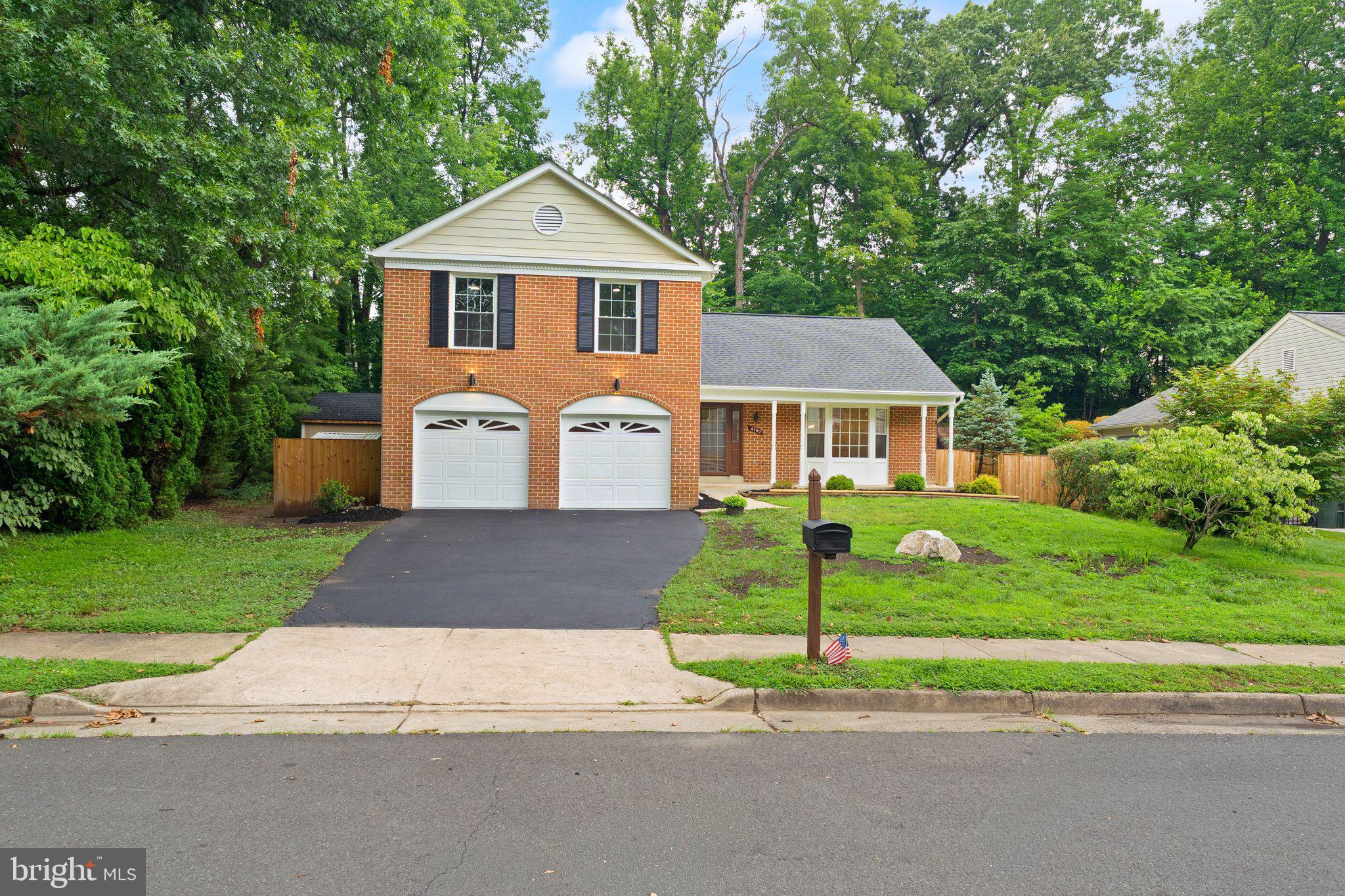 Welcome to this beautifully reimagined home in one of Springfield's most sought-after communities, where timeless design meets modern luxury. Thoughtfully renovated from top to bottom with exceptional attention to detail, this home offers the perfect blend of elegance, functionality, and everyday comfort.

Major capital improvements provide peace of mind for years to come, including a new roof (2026), new windows (2026), and a brand-new Trex deck (2026). The home also features a newer HVAC system (2020) and water heater (2021).

Inside, every space has been meticulously upgraded with high-end finishes throughout. The main level showcases luxury vinyl plank flooring, fresh designer paint, modern lighting, updated trim, and an open, inviting layout featuring a spacious living room, family room, dining area, laundry room, and a fully renovated bathroom.

The gourmet kitchen serves as the centerpiece of the home and has been designed with both style and functionality in mind. It features custom soft-close cabinetry, elegant quartz countertops, a stunning waterfall island, designer tile backsplash, premium stainless steel appliances, a farmhouse sink, and thoughtfully selected fixtures and hardware that elevate the entire space.

Upstairs, you'll find four generously sized bedrooms and two fully renovated bathrooms, including a spacious primary suite complete with a walk-in closet and a beautifully redesigned en-suite bath. Every bathroom throughout the home has been tastefully updated with custom vanities, porcelain tile flooring and shower surrounds, sleek glass accents, modern fixtures, premium lighting, and carefully selected finishes that create a luxurious spa-like atmosphere.

The finished lower level adds tremendous flexibility with two large multipurpose rooms that can easily serve as guest rooms, home offices, fitness areas, playrooms, or hobby spaces. An additional fully renovated bathroom and abundant storage make this level ideal for a variety of lifestyles.

Step outside to enjoy the brand-new Trex deck overlooking the backyard—perfect for entertaining, outdoor dining, or relaxing after a long day. Extensive professional landscaping has already been completed, providing an excellent foundation for the next owner to add their personal touch and create an incredible outdoor retreat.

Conveniently located just minutes from shopping, dining, parks, and everyday conveniences, this home also offers quick access to major commuter routes including I-95, I-495, and the Fairfax County Parkway, as well as nearby VRE and Metro options. Enjoy easy access to the Springfield Town Center, schools, recreation, and everything Northern Virginia has to offer, making this an exceptional opportunity to own a truly move-in-ready home in an unbeatable location.