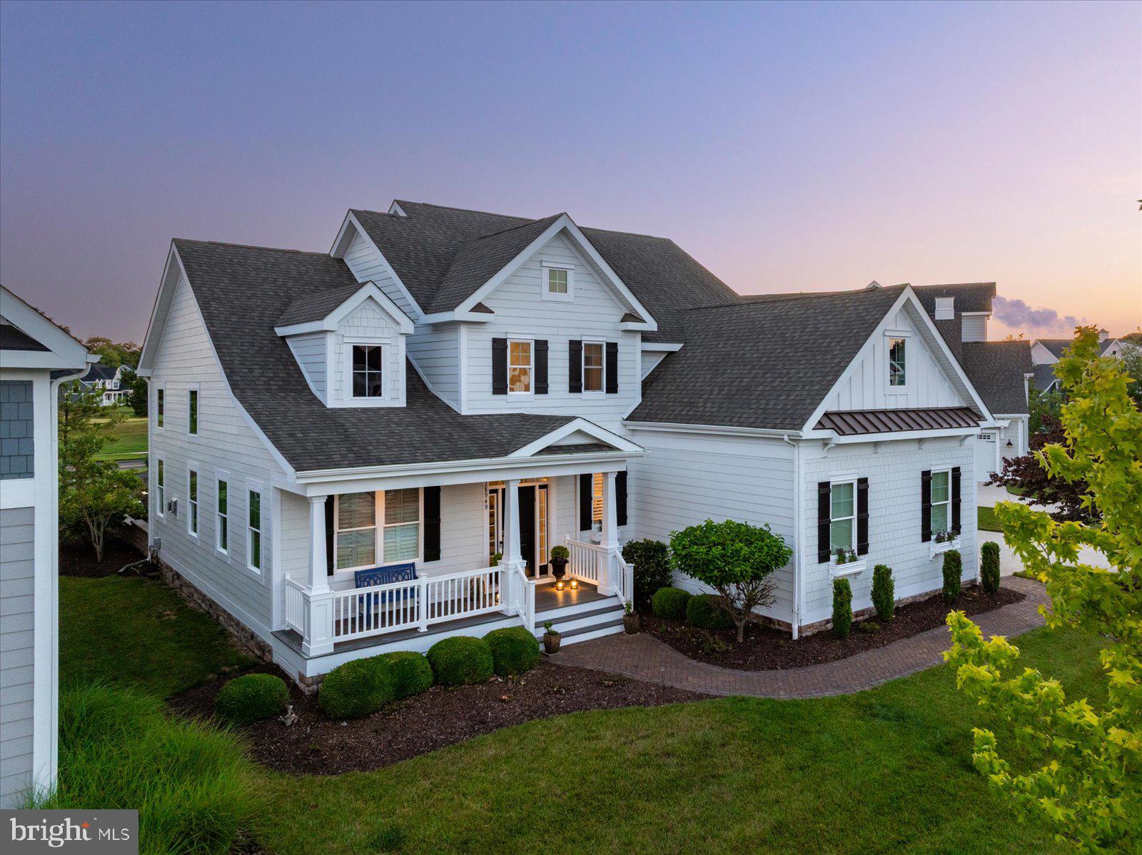 Welcome to this exceptional Shell Brothers Kingfisher model, featuring a highly desirable three-car garage and an impressive collection of premium upgrades. Perfectly positioned along the 8th hole of the Bayside Golf Course, this beautifully appointed home offers breathtaking golf course views and spectacular sunsets.
     Designed with both everyday comfort and elegant entertaining in mind, the spacious open-concept floor plan creates an inviting atmosphere throughout. The first-floor owner's suite serves as a private retreat, complete with generous walk-in closets featuring custom built-in shelving.
Upon entering the home, you'll find a private office/den with French doors, ideal for working from home or enjoying a quiet retreat. Conveniently located nearby is a full bathroom with a walk-in shower, offering added flexibility for guests.
     The main living area showcases quality craftsmanship and thoughtful upgrades, including plantation shutters, custom Hunter Douglas blinds and draperies, crown molding throughout, four ceiling fans, and a custom propane fireplace that serves as a stunning focal point.
     The second-floor features three spacious bedrooms, a full bathroom, and a large adjacent storage room that provides exceptional space for seasonal storage. A comfortable sitting area overlooking the upper level offers the perfect place to relax with a book or unwind at the end of the day.
     The outdoor living spaces are equally impressive. Enjoy a beautifully designed stone patio complete with a built-in grill and fire pit—ideal for entertaining family and friends. A spacious screened porch provides the perfect setting for relaxing while taking in the peaceful golf course views. An outdoor shower, conveniently located alongside the home, is perfect after a day at the beach or on the golf course.
     Additional features include a recently painted and freshly caulked exterior, enhancing both the home's beauty and long-term maintenance. A new whole-house Kohler generator provides reliable backup power and peace of mind in any season.
      Most of the furnishings may be included with the purchase, allowing for a truly turnkey opportunity. Artwork is excluded from the sale, and a list of furniture items that do not convey will be provided.
     This meticulously maintained home combines timeless elegance, exceptional craftsmanship, and outstanding indoor and outdoor living spaces in one of Bayside's most desirable golf course locations. This is a rare opportunity to enjoy luxury coastal living at its finest.