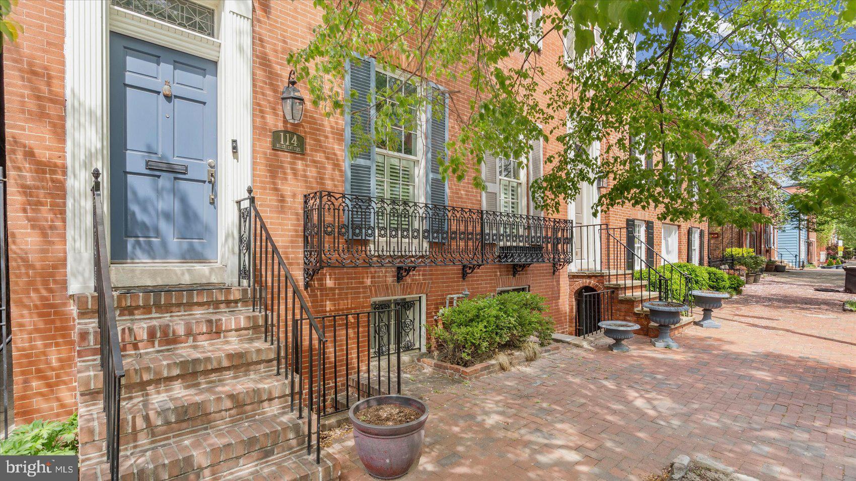 Built in 1825 and beautifully preserved, this exceptional Federal Hill residence celebrates over 200 years of Baltimore history while seamlessly incorporating thoughtful modern updates. Nestled along one of Federal Hill’s most cherished historic streets, distinguished by its original Belgian block sidewalks, the home offers a rare opportunity to own an authentic piece of Baltimore’s architectural heritage in one of the city’s most sought-after neighborhoods.

Inside, restored original heart pine floors, soaring 9-foot ceilings, four working fireplaces, exposed brick, gracefully curved brick walls, crown molding, and period-inspired custom millwork showcase the craftsmanship of its era. The thoughtfully renovated kitchen features maple cabinetry, granite countertops, stainless steel appliances, and French doors leading to a private enclosed brick courtyard. A beautifully remodeled primary bath complements the home’s timeless character, while French doors open to a charming Juliet balcony. The expansive third-floor terrace overlooks Gateway Park and offers panoramic views of Baltimore’s skyline, the Maryland Science Center, and the surrounding Inner Harbor neighborhood. Just one block from Federal Hill Park and moments from the Inner Harbor waterfront, Cross Street Market, restaurants, shopping, museums, and Baltimore’s professional sports venues, this is a rare offering that masterfully blends historic character, thoughtful modern updates, and one of Baltimore’s most desirable walkable lifestyles.