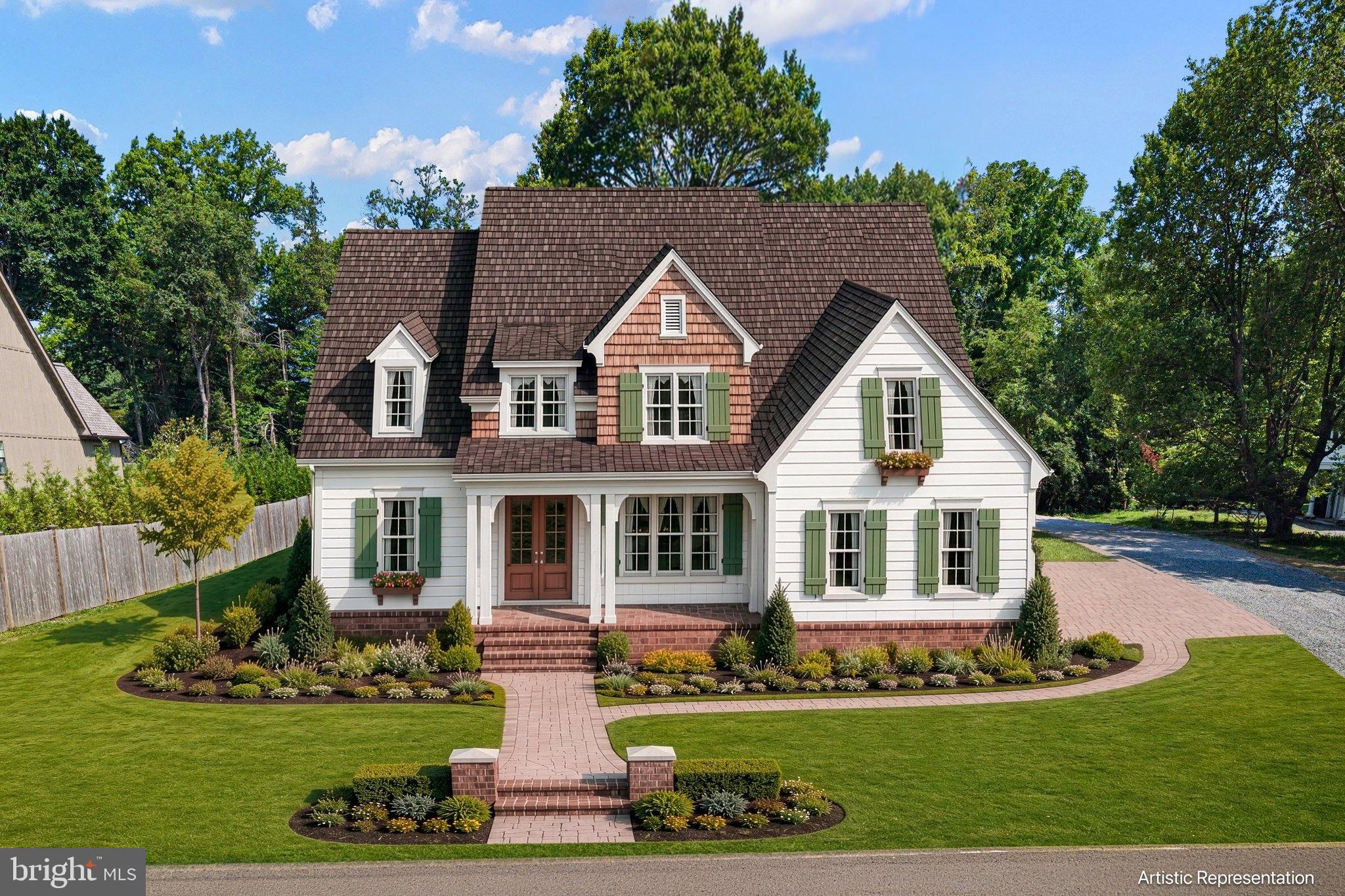 New Construction by Premier Builders in North Wilmington! A rare opportunity to own a custom luxury home tucked in the private enclave of Rock Manor, the community offers privacy, timeless architecture and exceptional location. This Classic Manor floor plan is thoughtfully designed with open-concept living spaces, abundant natural light and a private First Floor Primary Suite. This elegant retreat features a tray ceiling, a spa-inspired bath, and a spacious walk-in closet, creating a perfect sanctuary at the end of the day. At the heart of the home, the gourmet Kitchen is designed for everyday living and effortless entertaining, anchored by an oversized center island and complemented by a bright Breakfast Nook. Just beyond, the formal Dining Room, positioned off of the dramatic two-story Foyer provides an inviting setting for holiday gatherings and special occasions. A convenient Butler's pantry offers seamless access to the Kitchen, making entertaining a breeze. The impressive Family Room is highlighted by a 12 foot coffered ceiling, a gas fireplace and elongated rear-facing windows that fill the space with natural light while overlooking the back yard. The secondary First-Floor Bedroom offers exceptional flexibility as a guest suite or private home office. Completing the main level are a generously sized Laundry Room and a functional Mud Room with built-ins. The second floor boasts 2 additional Bedrooms, a full Bathroom and a finished Bonus Room, providing ample space for family, guests or recreation.  
Rock Manor will consist of just 3 custom homes situated on thoughtfully designed half-acre home sites. Each home site has been carefully planned to maximize usable outdoor space while preserving the property's mature trees and natural landscaping. This enclave includes underground utilities, natural gas, public water and sewer combining modern convenience in a peaceful setting. Located just minutes from downtown Wilmington, Rock Manor offers the tranquility of suburban life while remaining close to dining, shopping, parks and cultural attractions. With convenient access  to I-95, Wilmington, the Philadelphia Airport, Center City and the surrounding region, commuting and travel are effortless. Experience the rare combination of luxury, privacy and convenience in one of North Wilmington's desirable new home communities. Owner is a licensed Realtor in the state of Delaware.