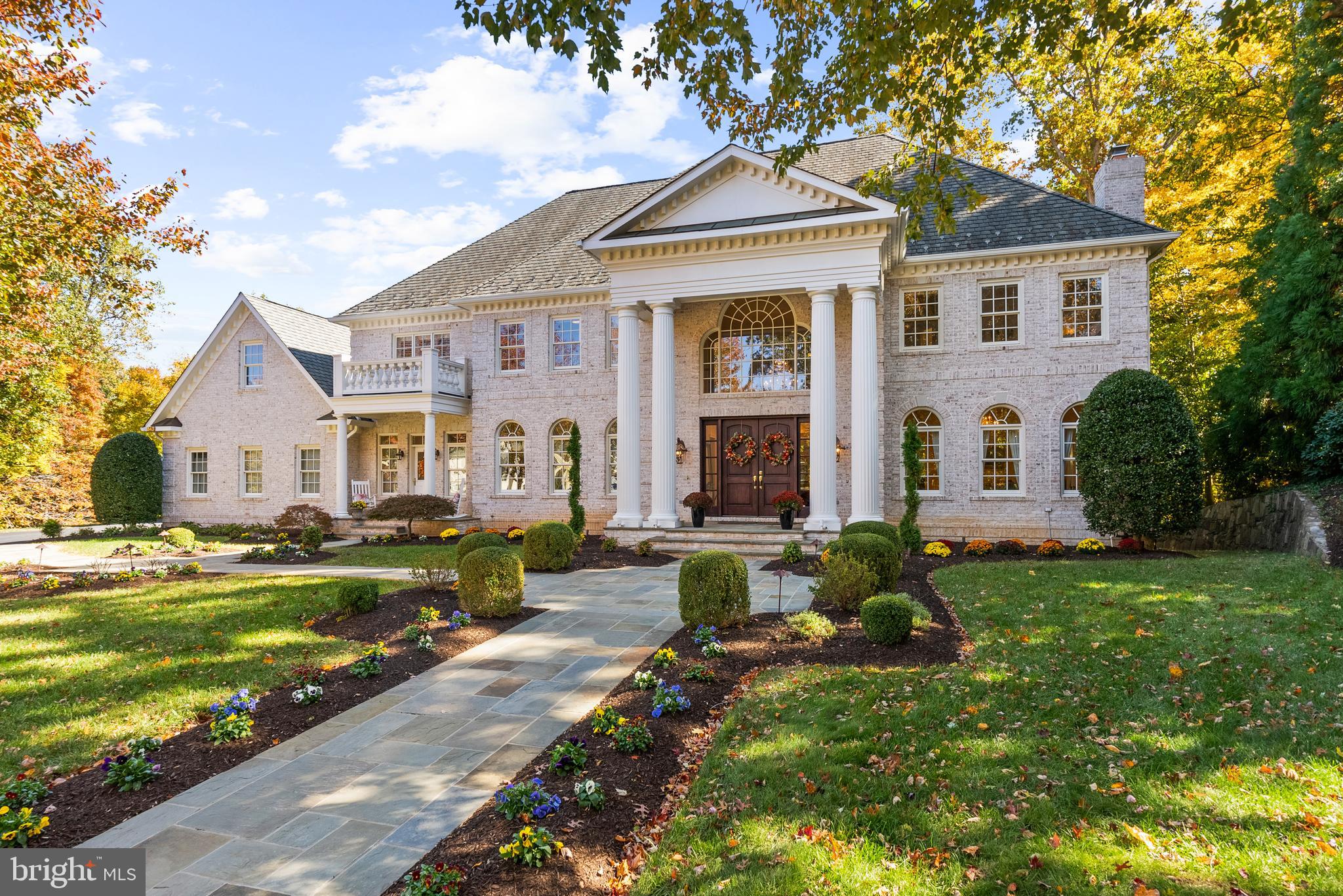 Luxury and sophistication are evident throughout this stunning all-brick Georgian Colonial residence situated within the Custom Home section of The Reserve. Located on a tranquil cul de sac, this elegant residence boasts a prime position overlooking a sprawling 1.1-acre homesite enveloped by the protected natural beauty of Scott's Run and offering year-round water views. With an emphasis on privacy, this home redefines elegance and offers an abundance of space across its three fully finished levels. With just under 11,000 square feet, 7 bedrooms, 7 full baths, and 3 half baths, every member of the family or visiting guest will find their own sanctuary. Generous public room sizes provide a sense of grandeur, complemented by four exquisite fireplaces that add warmth and charm to the home. Located adjacent to the two-story entry hall, the formal dining room and living room provide the perfect backdrop for entertaining.

Working from home or indulging in your hobbies is a breeze with two dedicated home offices or hobby rooms. The family room, complete with a large fireplace, is seamlessly connected to the spacious gourmet kitchen, making it the heart of the home.

Upstairs, you'll find 5 bedrooms, each with its own en-suite full bath, ensuring everyone's comfort and privacy. The owner's suite is a true retreat, featuring a soothing fireplace, a spacious sitting area, and generous walk-in closets. The master bath has been thoughtfully updated with luxurious marble, double vanities, an extra-large shower, and a standalone bathtub for ultimate relaxation.

The walkout lower level offers an array of possibilities with an exercise room, media room, 2 bedrooms with en-suite full baths, a family room with yet another fireplace, and a recreation room with a bar area. Abundant storage throughout the home provides convenience and organization. The home is complete with a 4-car garage and a circular motor court for easy access. 

The Reserve is more than just a community; it's a lifestyle. Situated on over 258 wooded acres in prestigious McLean, Virginia, this enclave of 166 homes features custom estate-sized residences on generously sized lots. The landscape is adorned with mature trees, stone walls, and natural landscaping, offering a breathtaking backdrop to daily life. Residents enjoy around-the-clock security and additional services provided by the security staff stationed at The Reserve's Gatehouse.

For commuters, The Reserve is a dream come true, with easy access to major commuting arteries, including the 495-Capital Beltway, I-66, Georgetown Pike, and the George Washington Parkway. The neighborhood is served by top-tier schools, including Churchill Elementary School, Cooper Middle School, and Langley High School.

Don't miss this opportunity to experience the pinnacle of luxury living in The Reserve. This property offers an unmatched combination of timeless elegance, privacy, and convenience in one of the most prestigious communities in the area.