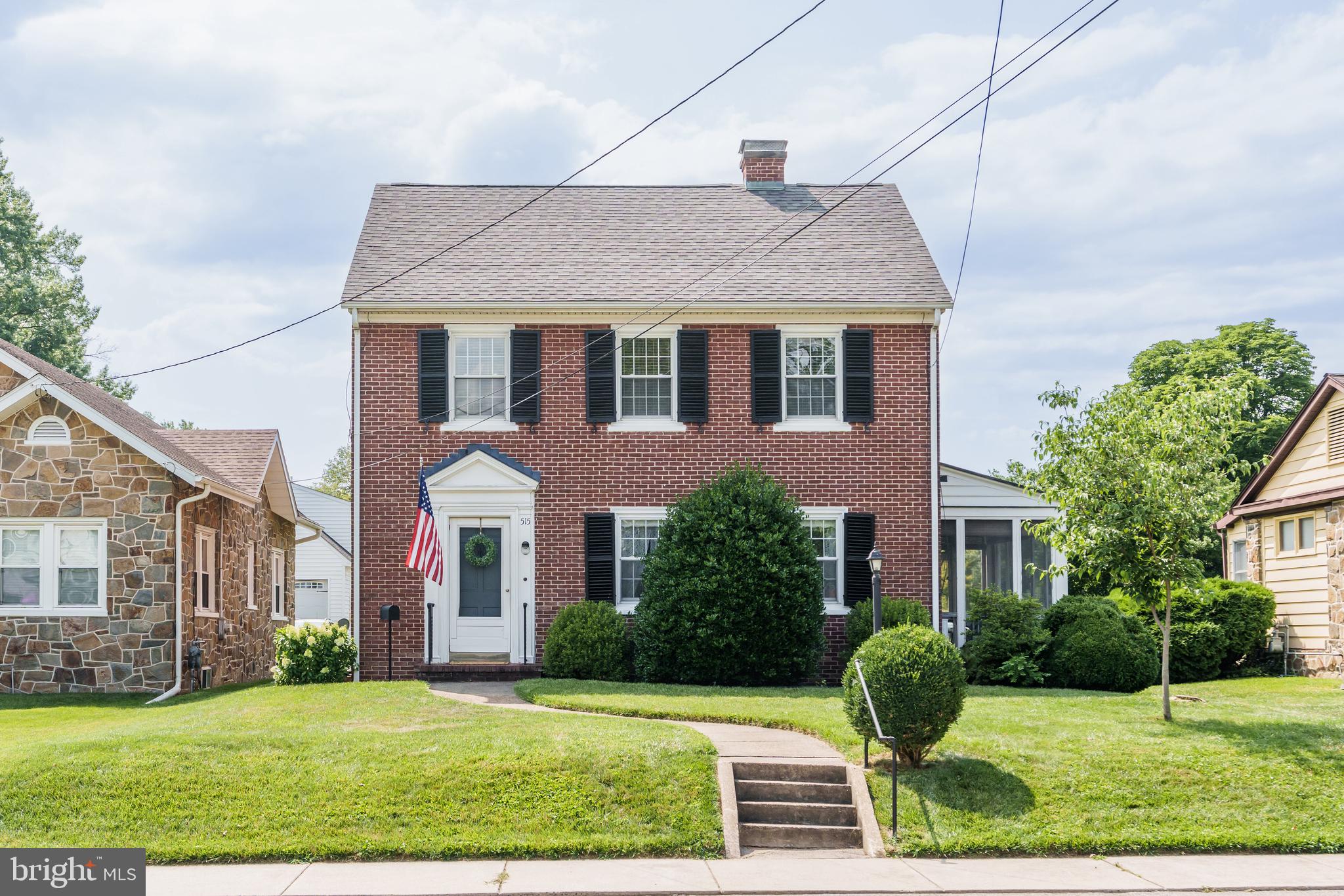 There's no place like home at this classic all-brick Colonial in the desirable Elkton Heights neighborhood. Built in 1940, this well maintained home features hardwood floors throughout much of the main and upper levels, a bright kitchen with a cozy breakfast nook, a formal dining room, a convenient main-level half bath, and a spacious living room with a wood-burning fireplace. Just off the living room, the screened porch provides a comfortable place to relax, entertain, or enjoy your morning coffee. Upstairs are three bedrooms and a full bath, including a spacious primary bedroom with a charming arched alcove that's perfect for a desk, vanity, or reading nook. The partially finished basement provides additional flexible living space, while the unfinished workshop is ideal for projects or extra storage. A detached one-car garage and driveway, accessed from the rear alley, provide ample off-street parking. Located just minutes from downtown Elkton, the Delaware state line, and I-95, this home offers the perfect blend of neighborhood charm and everyday convenience. Schedule your private tour today!