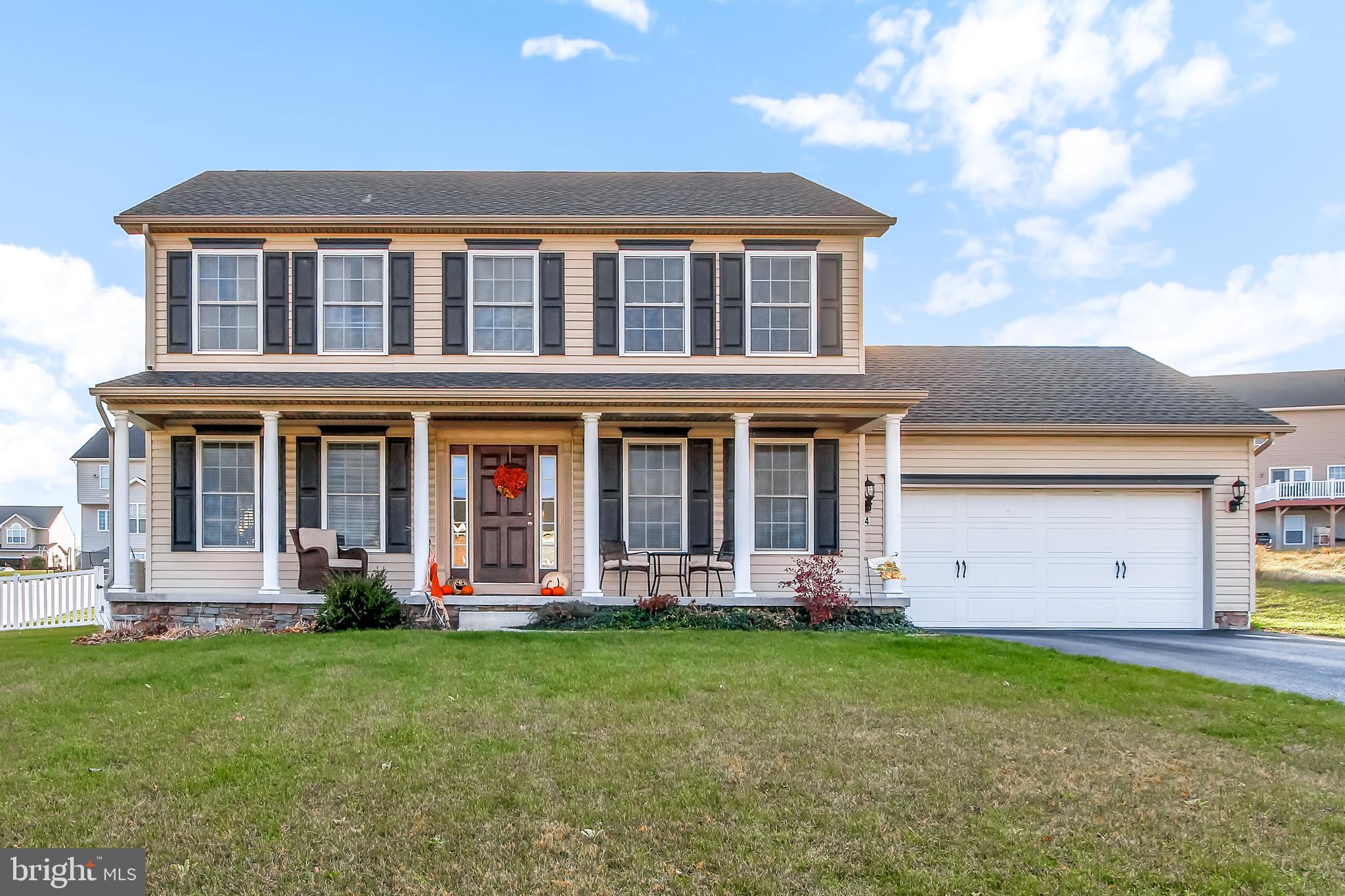 Due to Governor Tom Wolf's mandate regarding COVID-19, we are currently unable to allow any in-person showings of our listed properties.  Contact your agent for more information.  LOOK AT THIS NEW PRICE!!  Better than new!  4 bedrooms, 2 1/2 baths home with upgraded laminate flooring throughout the 1st floor!  Open floor plan with great room off the kitchen area. Breakfast area and formal dining room. Slider from breakfast room to the beautiful paver patio with built in firepit/grilling area and vinyl fencing around the nice yard.  Relax on the front porch.  Room to expand in the full basement with an outside entrance and rough in for another future bath!  ALL BEDROOMS HAVE NICE CLOSETS WITH CUSTOMIZED SHELVING!  This home has a lot more to offer than building new!