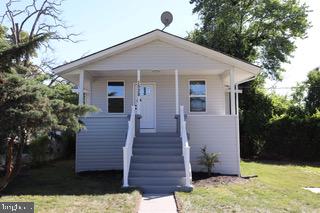 Beautifully renovated and improved spacious  home with 5 Bedrooms & 3  Full Baths. New Floors, New Paint, New Windows & Doors, 2 New kitchens with upgraqded SS appliances.  Fully finished walk out basement with an in law suite for a 2 household environment.