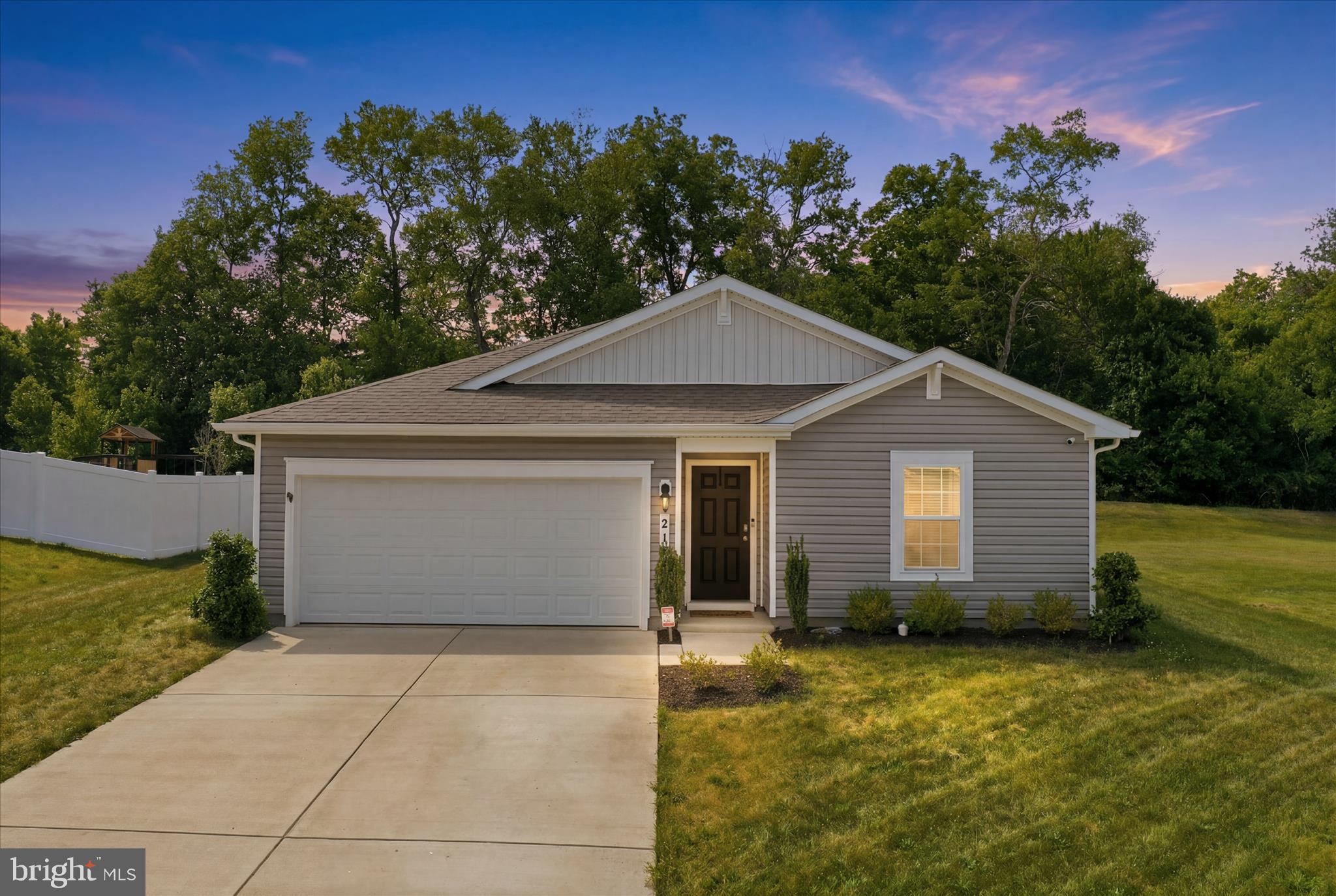 Welcome to 21 Wilson Drive located in the desirable Shenandoah Crossing community in Berryville. This popular Freeport model offers four bedrooms, two full baths, and a thoughtfully designed open floor plan that blends comfort, functionality, and modern living.

The spacious kitchen features abundant cabinetry, a large center island, and a bright dining area that opens seamlessly to the inviting family room, creating the perfect space for everyday living and entertaining. The private primary suite provides a relaxing retreat with an ensuite bath and generous closet space, while three additional bedrooms offer flexibility for guests, a home office, hobbies, or growing household needs.

Step outside and enjoy the fully fenced backyard, ideal for pets, play, gardening, or outdoor gatherings. Whether hosting a cookout, relaxing with your morning coffee, or enjoying an evening under the stars, this outdoor space is ready to be enjoyed.

Residents of Shenandoah Crossing appreciate the community setting while remaining just minutes from Route 7, Route 340, and downtown Berryville. Nearby attractions include the Shenandoah River, State Arboretum of Virginia at Blandy Experimental Farm, Shenandoah National Park, Sky Meadows State Park, local wineries, breweries, farmers markets, and the many outdoor recreation opportunities that make Clarke County such a desirable place to call home.

Offering four bedrooms, a fenced backyard, and a sought after location, this move-in ready home delivers exceptional value in one of the most convenient communities within Berryville.