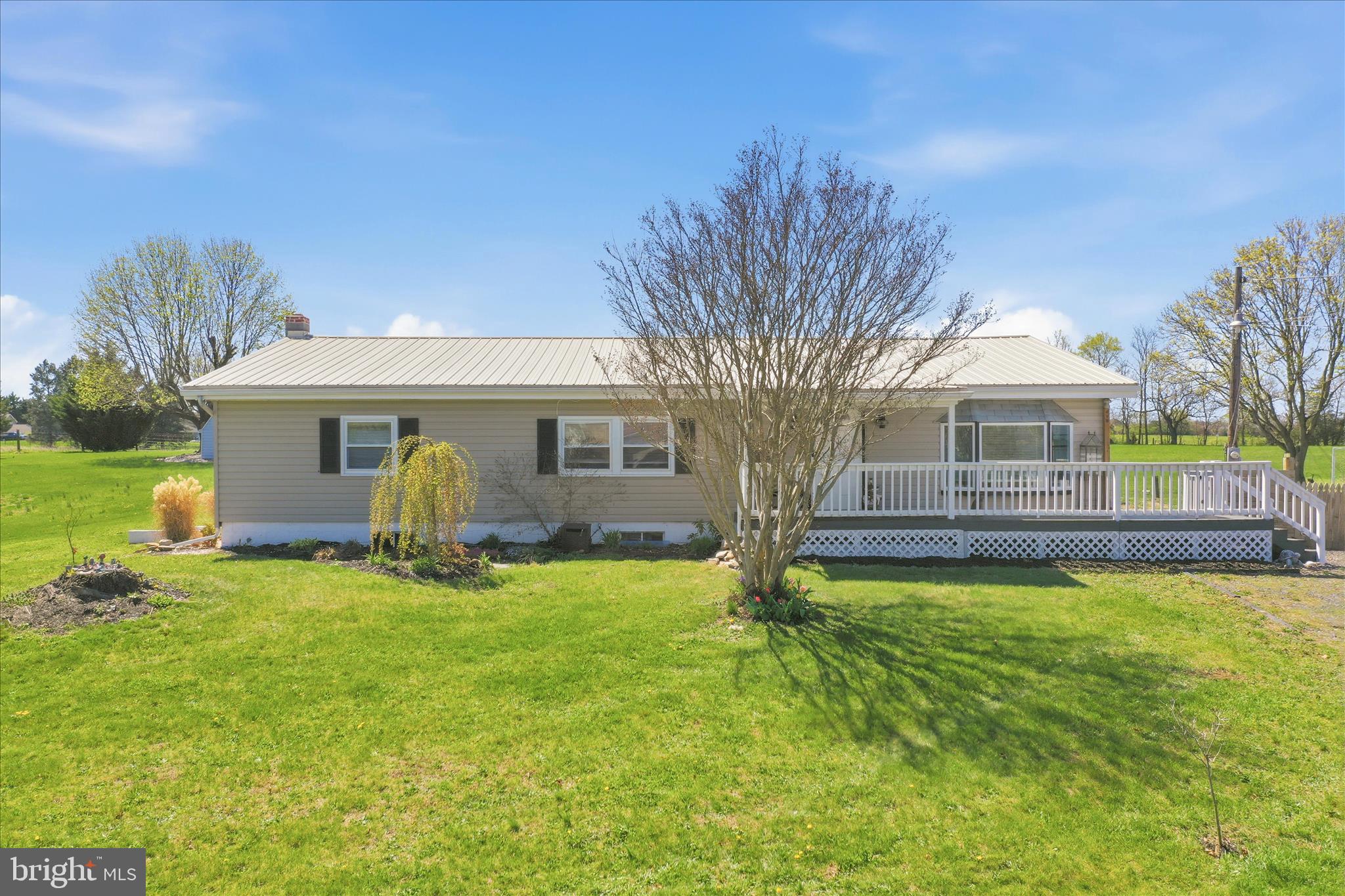 Welcome home to this beautifully updated rancher offering the perfect blend of comfort, space, and convenience! Situated on a generous half-acre lot, this 4-bedroom, 2.5-bath home features numerous upgrades and improvements throughout. Step inside to find lvp and hardwood floors, fresh paint, and updated drywall creating a clean, modern feel.
The quaint layout provides plenty of room for everyday living and entertaining, while inviting in natural light that showcase the peaceful surroundings. Whether you prefer a den, office or bedroom, utilize the space and rooms to your taste and need.  Main level breezeway could be converted into a laundry room.  Outside, enjoy a fully fenced backyard—ideal for pets, play, or relaxing evenings.  You'll find plenty of storage space, whether in the full basement or the loft area in the living room.
A standout feature is the newly built detached garage, complete with electric, passthrough doors, and an upper-level loft—perfect for a studio, workshop, or additional storage.
Conveniently located near restaurants and interstate access, this home offers easy commuting while still delivering a quiet country setting with scenic views. A rare find combining upgrades, functionality, and location—don’t miss this one!
