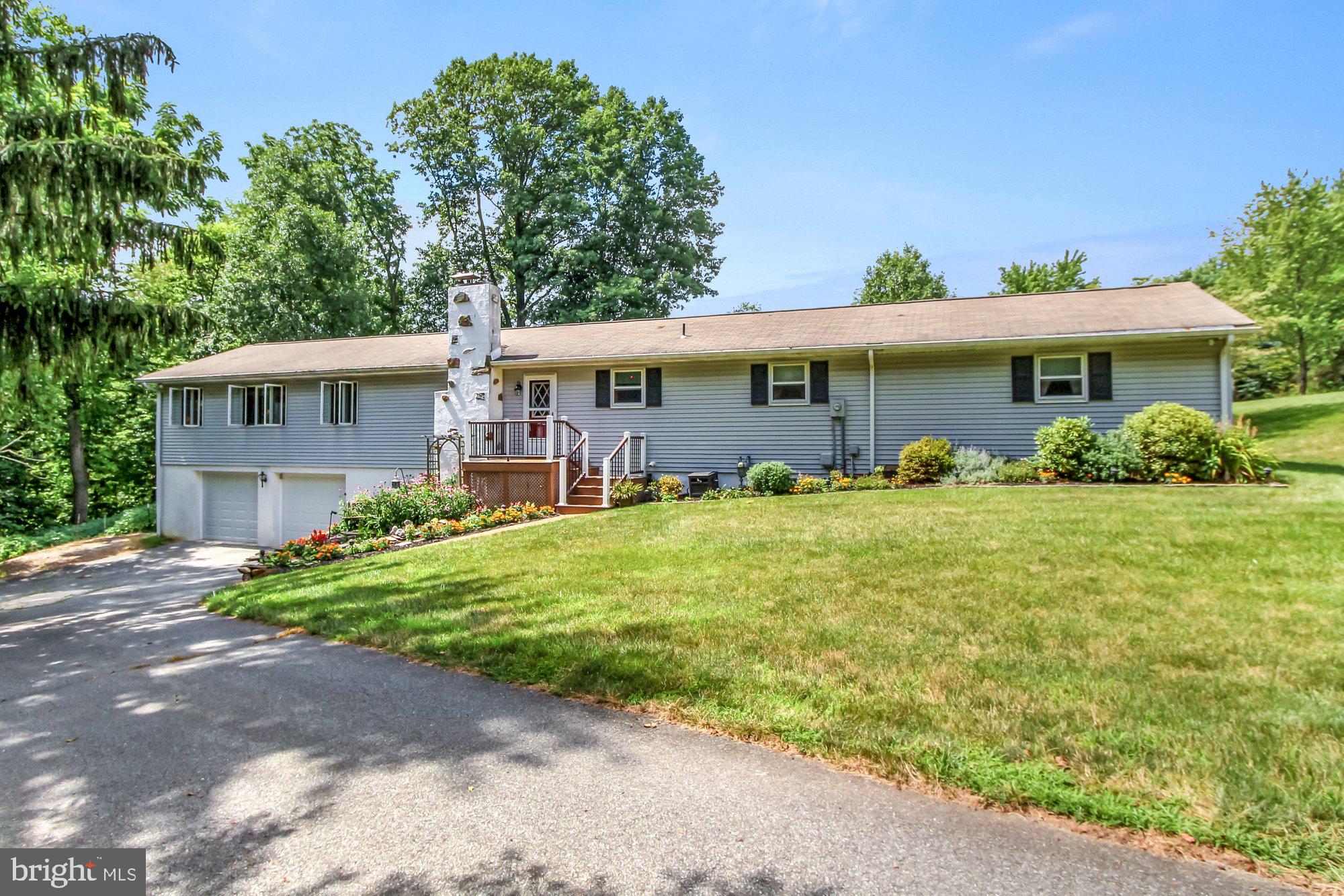 A little bit of country comes with this well-maintained 3BR, 2BA rancher, with built-in 2-car garage and finished lower level. Located in Manifold Manor, a small no-thru street community in Windsor Township, where you are conveniently located minutes to shopping, restaurants, tons of conveniences, and a short commute to both I83 and Rt30.  The home sits on a private 1.355 acre lot, in a cul-de-sac, surrounded by trees and evergreens. The interior has a flexible floorplan; beautiful country kitchen with island and stone, wood-burning fireplace; large dining, living room space; 1st floor laundry room and mud area, off the back deck; a primary bedroom suite, with private deck entry. The lower level is mostly finished with garage access.  The garage features double entry doors and a double entry service door. An ornamental fish pond is located off the front entry deck. There is also a large storage shed, with electric, in the rear. Enjoy evenings on the deck gazing at the stars, taking in nature, eating a meal, reading a book, or plain relaxing. It is your opportunity to be away from the hustle and bustle, without giving up conveniences.  AGENTS - Please read Agent Remarks!
