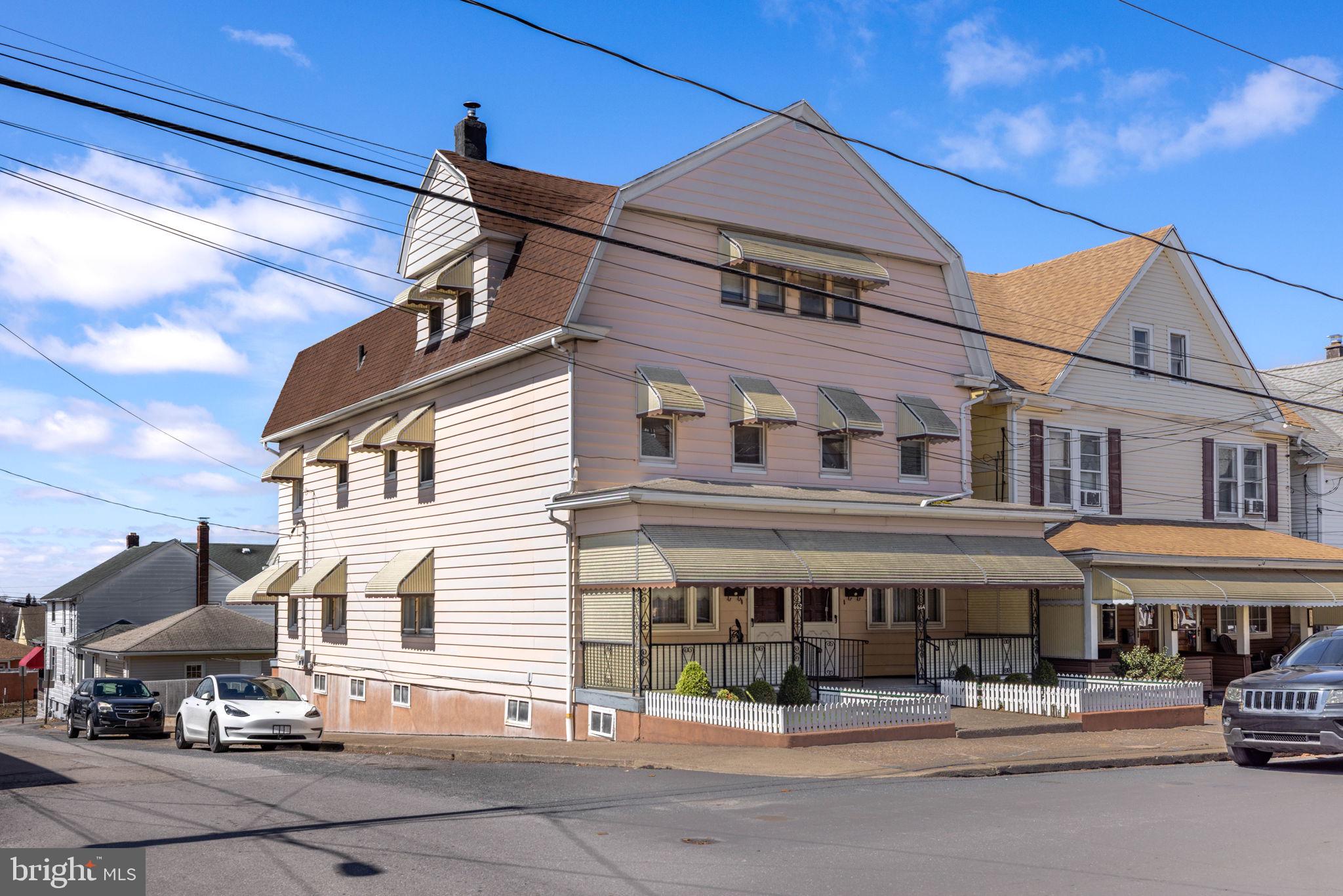 Multiple Offers Received Highest & Best by Monday 4/7/25 5:00pm
Nestled in the heart of Hazleton, this beautiful three-story duplex offers a perfect blend of historic charm and modern potential. Having been a cherished home for generations, it is now ready to welcome new owners to create lasting memories. Whether you're looking for a spacious family home, a multi-generational living space, or a solid investment opportunity, this property checks all the boxes.

Interior Features:
High ceilings throughout enhance the sense of space and elegance.

Expansive living areas on the main floor provide ample room for relaxation and entertaining.

Separate formal dining room – perfect for gatherings and family meals.

Large kitchen with plenty of counter space and storage, ideal for home cooks and meal prep.

Bedroom & Bathroom Layout:
Second Floor:

Three well-sized bedrooms with plenty of natural light.

Full bathroom centrally located for convenience.

Third Floor:

Flexible space that can be used as two to three additional bedrooms, a home office, a cozy sitting area, or a craft/hobby room.

Outdoor & Additional Features:
Charming covered front porch – a great spot to enjoy morning coffee or unwind in the evenings.

Enclosed back porch offering additional space for year-round enjoyment.

Large fenced-in backyard – perfect for children, pets, or outdoor entertaining.

Detached 2-car garage  providing secure parking and additional storage space.

Potential & Investment Appeal:
Ideal for large families looking for extra space.

Great for multi-generational living with separate areas for privacy.

Excellent investment opportunity for rental income or conversion into a multi-unit property.

Don't miss out on this versatile and character-filled home in a prime location. Schedule a showing today and discover all the possibilities this property has to offer!