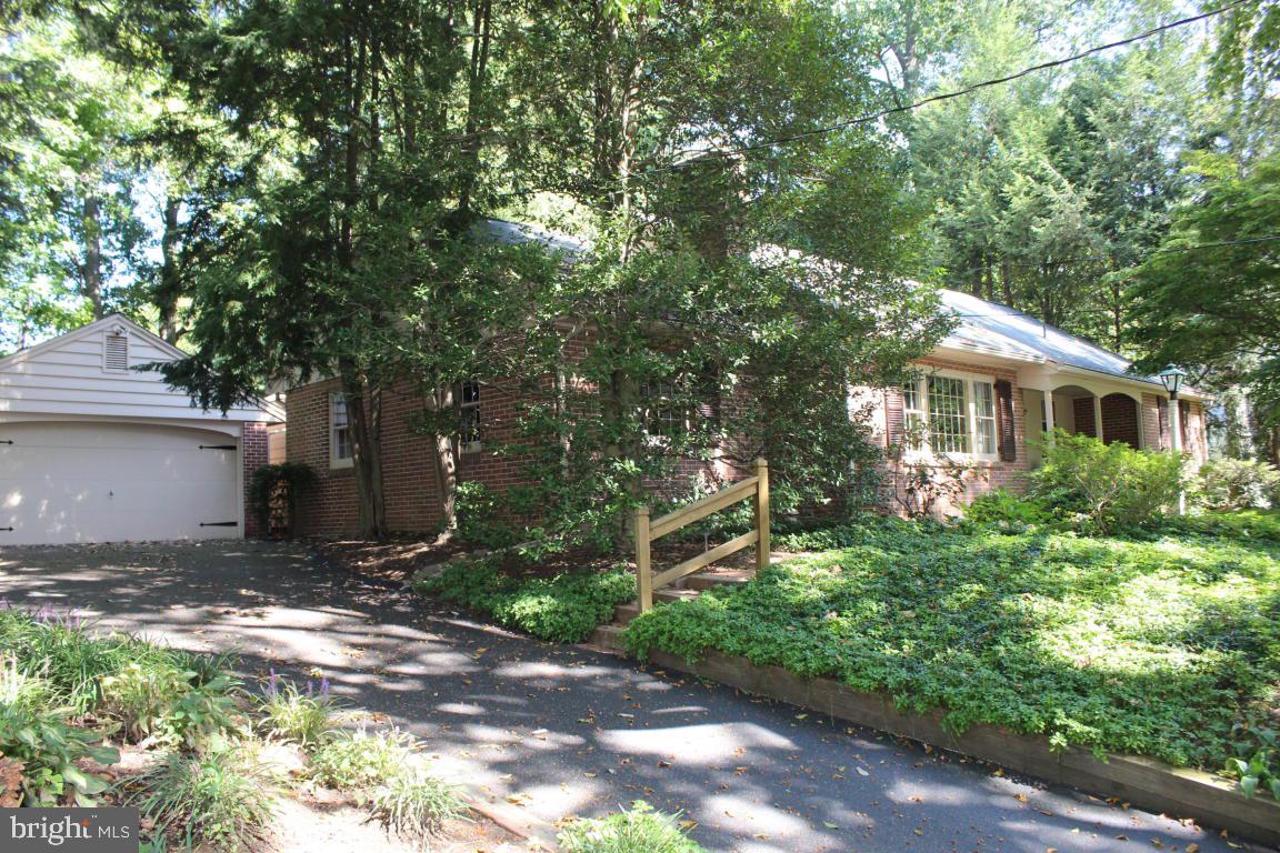 Lovely Akron home nestled quietly in a cul-de-sac. 4 bedrooms including a master suite or teenagers quarters, beautiful wood flooring, two wood burning fireplaces and uniqueness spread through out the home. Open kitchen and family room with a Raleigh Tavern island. First floor bedrooms and laundry. Enjoy the peaceful backyard from the screened porch.
