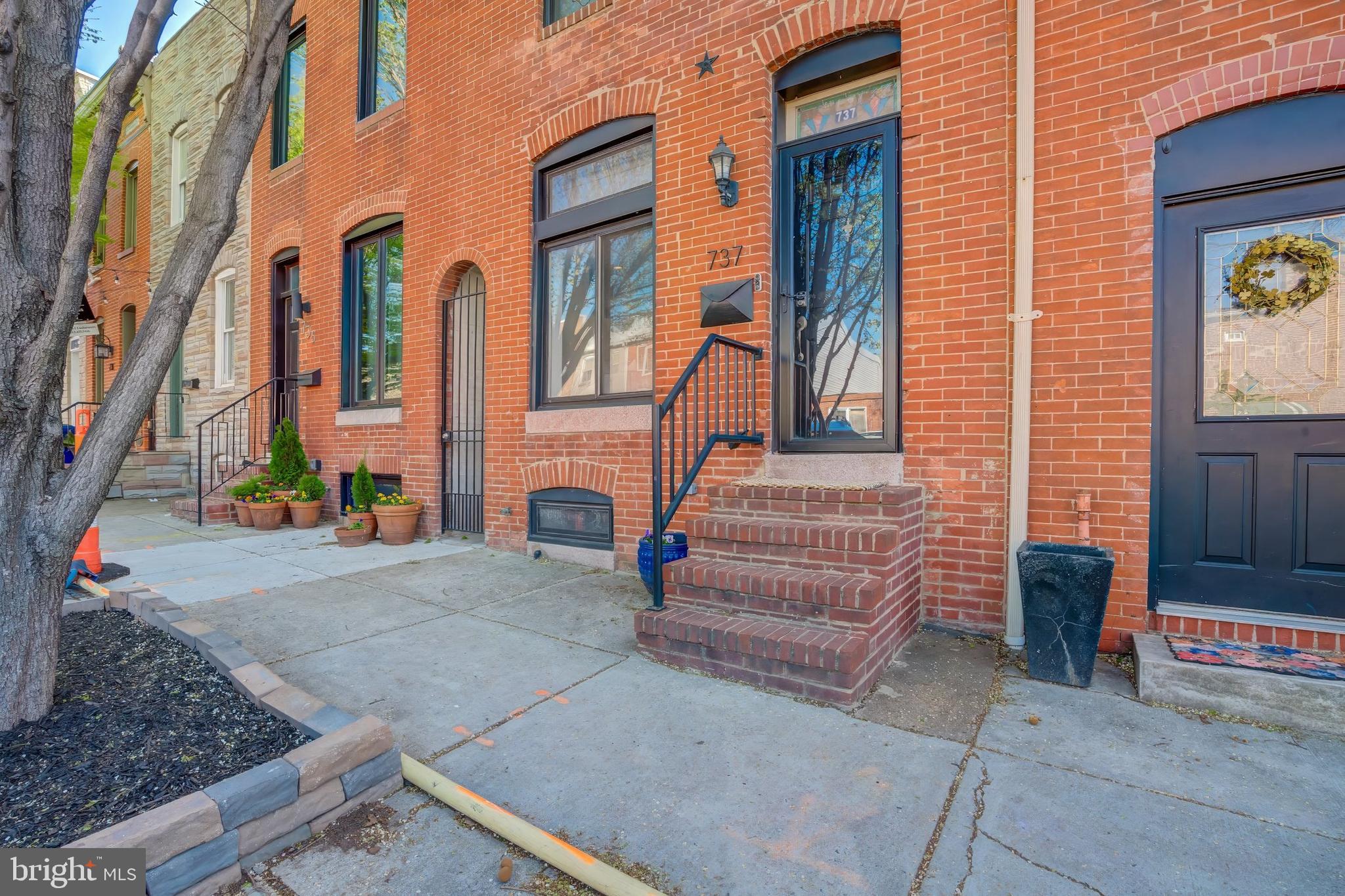 Welcome Home to this beautifully maintained brick townhome nestled in the heart of one of Baltimore’s most desirable neighborhoods. This spacious home offers 2 full bedrooms and 2 full bathrooms, providing the perfect layout for comfortable city living or hosting guests.
You'll love the exposed brick throughout, adding warmth and historic charm to every room. The bright and spacious kitchen is a true highlight, featuring white cabinets, a large kitchen island, granite countertops, and stainless steel appliances. The kitchen opens to the dining room, which offers additional cabinet space, a built-in wine rack, and wine fridge—perfect for entertaining.
The finished basement offers versatile space ideal for a home office, gym, or extra living area. Step outside to your private backyard, perfect for relaxing or outdoor gatherings. Cap off your evenings on the rooftop deck, where you can take in stunning city views and sunsets over the skyline.
Located just minutes from Canton Square, Patterson Park, and the waterfront, this home combines charm, convenience, and style in one unbeatable package.
Recent Updates: Furnace 2024 ; Water Heater 2019 ; Washer & Dryer 2022 ; Dishwasher 2023 ; 
Sump Pump 2024 ; Gutter 2024 ; Door for Deck 2023 ; Toilet in 2nd full bath 2023