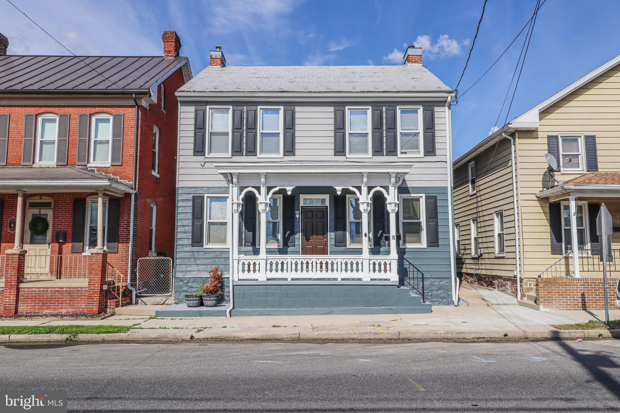 This exquisite Victorian twin home, built in 1950, seamlessly blends classic charm with modern comforts. Spanning 1,788 sq. ft., it boasts five spacious bedrooms and three full bathrooms, perfect for both relaxation and entertainment. The exterior features elegant aluminum siding, enhanced by inviting outdoor lighting and well-maintained sidewalks, creating a warm and welcoming atmosphere. Step inside to discover a thoughtfully designed layout, the heart of the home is the well-equipped kitchen, featuring essential appliances such as a gas oven/range, refrigerator, dishwasher, and washer/dryer in the full basement. The enclosed porch offers a serene space to unwind, with a total of three garage spaces, parking will never be a concern. Set on a 0.14-acre lot, this property is a true sanctuary, this residence is not just a house; it's a place where memories are made, offering a lifestyle of comfort and sophistication. Enjoy the tranquility of your surroundings, with streetlights illuminating your evenings. Experience the perfect blend of luxury and homeliness in this remarkable residence. Don't miss the opportunity to make this delightful property your own. Schedule a visit today and experience the warmth and comfort that awaits you!