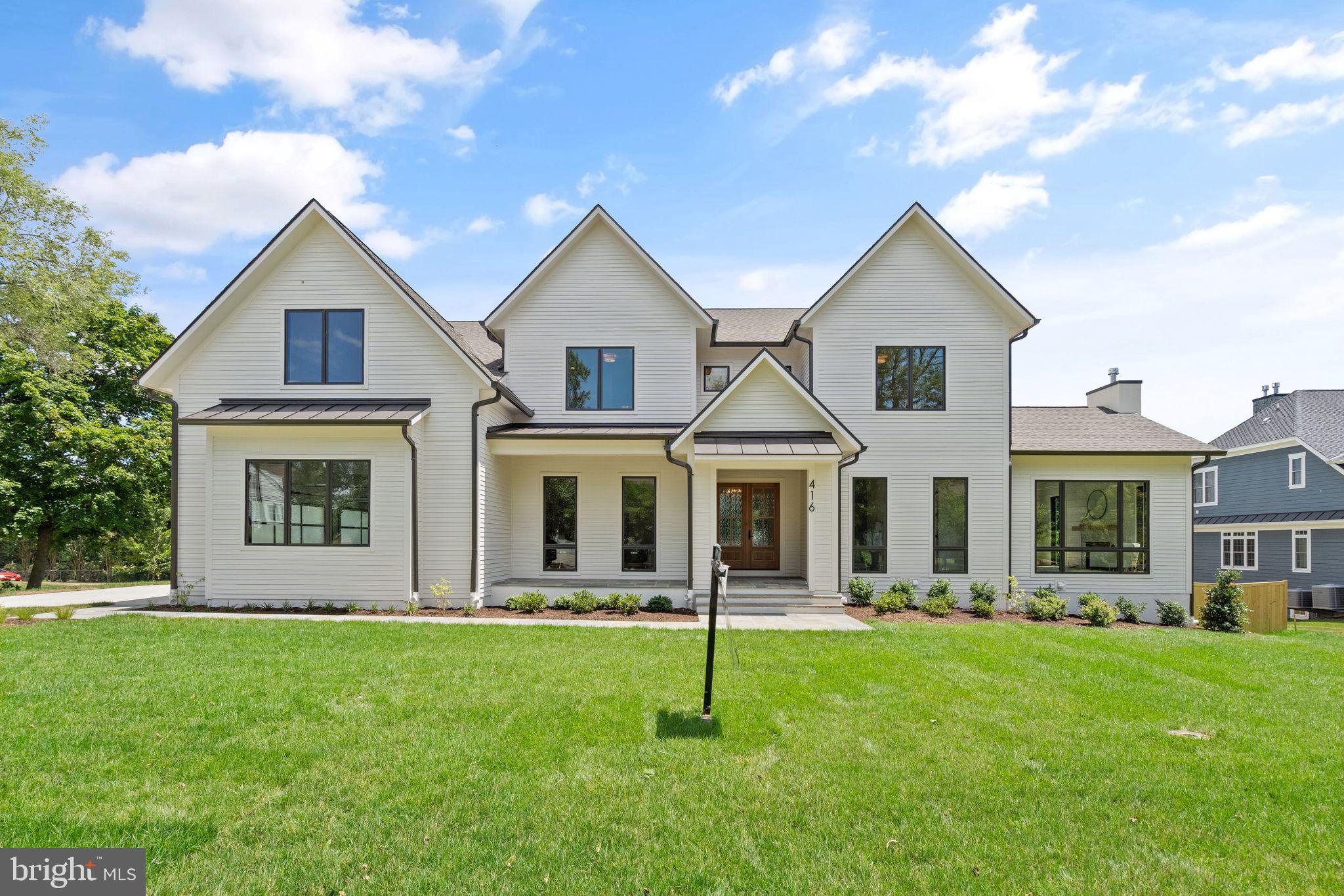 416  Windover Avenue, is a masterpiece of modern luxury and comfort in the heart of Vienna, Virginia, designed by the renowned team at Reel Homes. This brand-new construction home boasts unparalleled sophistication, featuring 7 bedrooms, 9 total bathrooms, and almost 9000 square feet of meticulously designed living space. The home is finished in all of its splendor, and is move-in-ready. 

The home is a one-of-a-kind, custom design, and features everything you'd expect, and many things you don't, like an included elevator and a tucked-away mudroom. Reel Homes are renowned for their attention to detail, and this home doesn't disappoint. The heart of this home is undoubtedly the gourmet kitchen, a chef's dream with a massive pantry, SubZero and Wolf appliances, custom cabinetry, and a spacious island for culinary creativity. The open floor plan seamlessly connects the kitchen to the dining and living areas which are detailed with custom ceiling woodwork and floor-to-ceiling Pella windows, providing the perfect setting for entertaining guests or enjoying quality time with family, and tons of natural light. You can choose to then relax in the screened-in porch off of the living room, which is a 3-season space with its built-in heaters and gas fireplace, or retire to the beautiful in-law/primary suite with a walk-in closet and beautiful custom bathroom. 

Upstairs, the indulgent primary suite offers a private retreat with a spa-like ensuite bathroom, heated floors, and a huge walk-in closet. It has tons of natural light, and plenty of space to customize your dream primary retreat!  The four additional bedrooms are all complete with unique walk-in closets and private bathrooms that offer varying design and tons of luxury. The laundry room is also a treat, with custom cabinetry and all of the space you deserve. 

The lower level of this home is an entertainment haven, featuring a fully finished basement with a huge rec room, home gym, wet bar with beverage fridge, merely 3 walk-up stairs,  and a 7th en-suite bedroom, and a theater room. And not to be missed, this lot is huge!!! Tons of space to play, entertain, or lounge around the wonderful 100-year old magnolia tree!!

With attention to detail at every turn, 416 Windover Avenue is not just a home; it's a statement of luxury living in Vienna, Virginia. The design you can see is impeccable, and the attention to detail behind the walls gives you confidence that this house is worth every penny. Reel Homes has done it again.