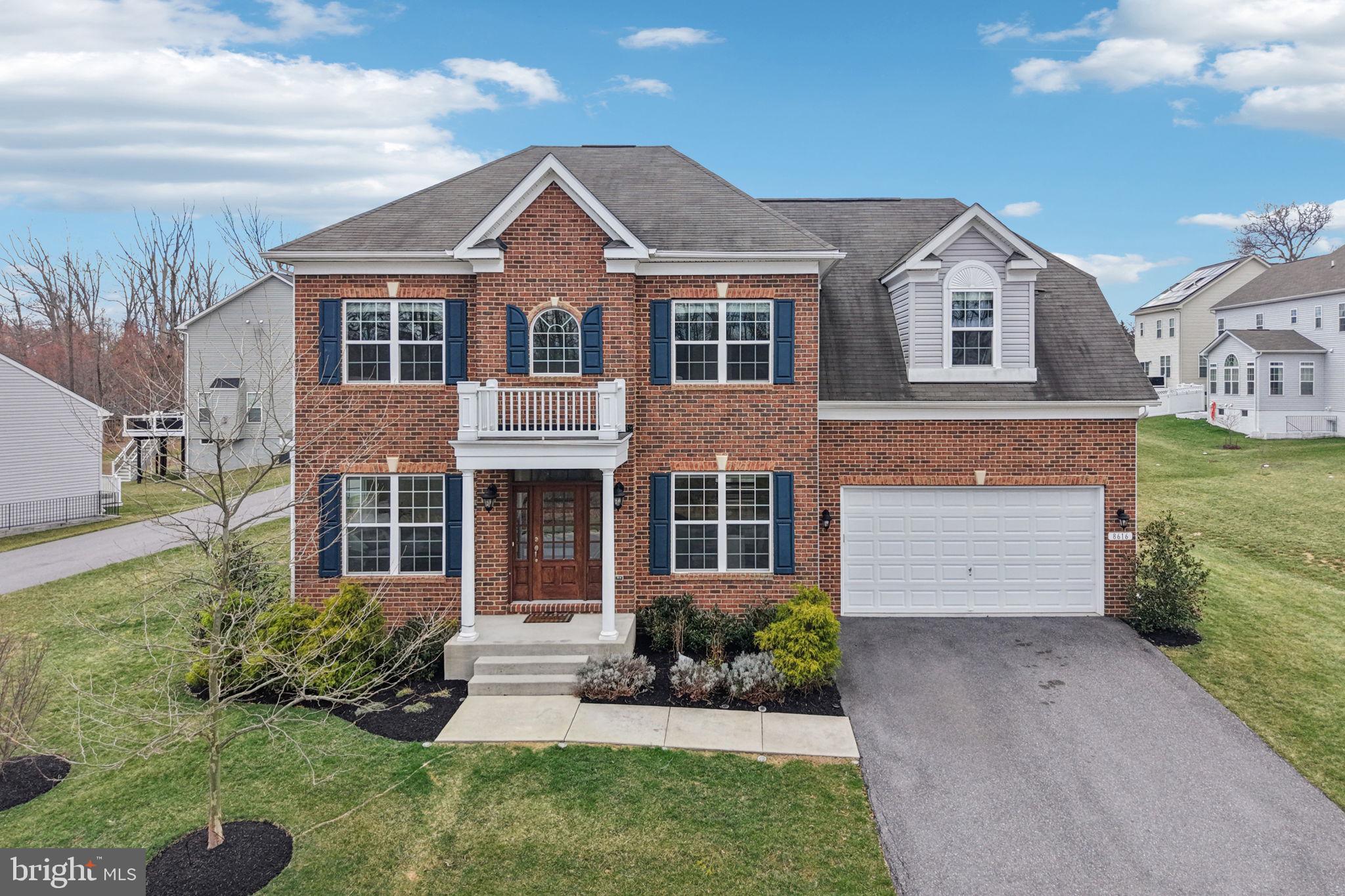 4 spacious bedrooms, 3.5 baths, and a 2-car garage with additional driveway parking.  Unfinished walk-out basement.