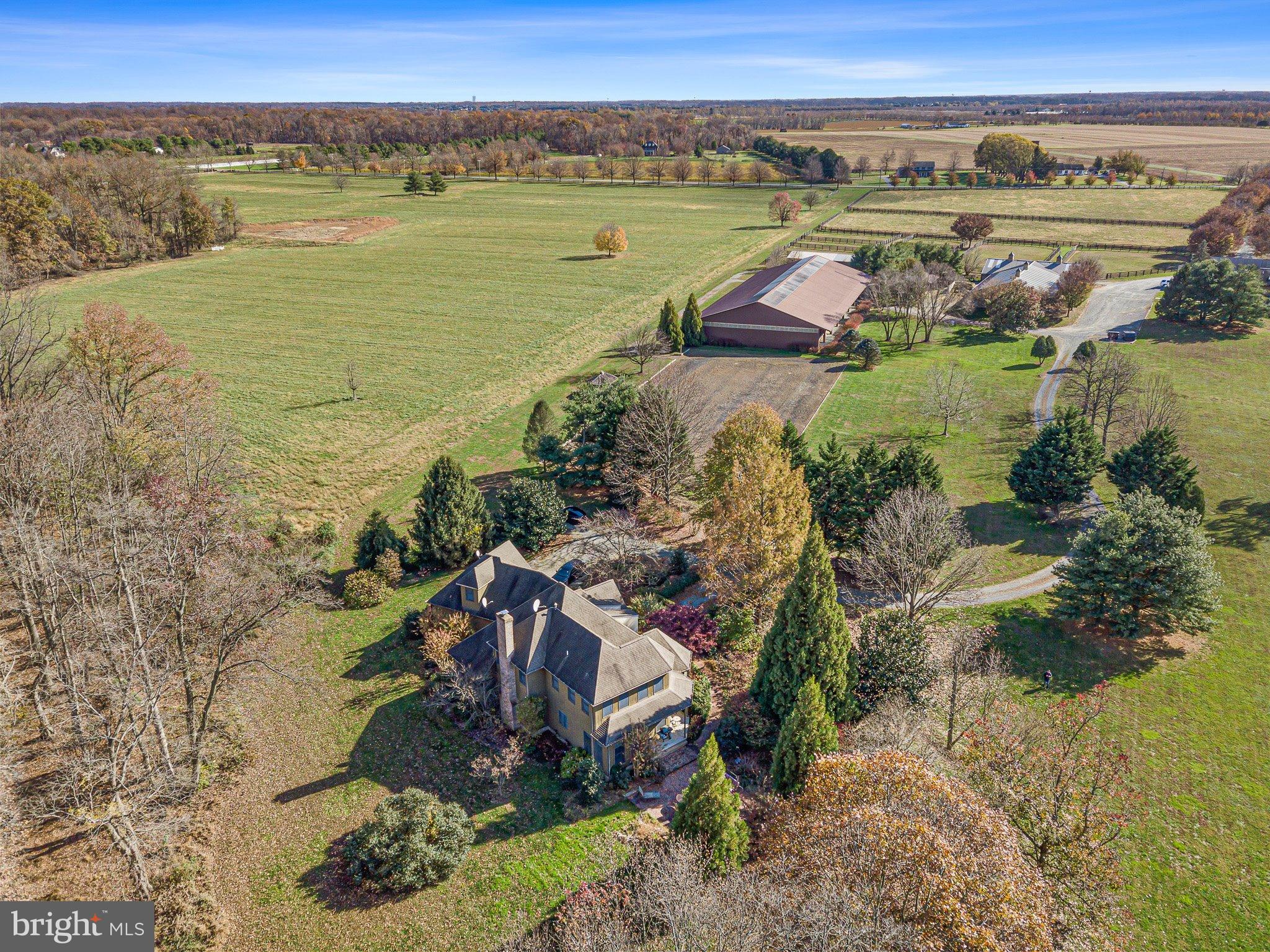 WEST is a lovely 62 acre Horse Farm/Estate property situated in the vast protected horse country of South Chesapeake City, Maryland.  The property features a lovely stone and frame 4 bedroom and 2.5 bath two story home with wood and tile floors, high ceilings, lots of built-ins, fireplace, attached garage, screened porch, and kitchen with lots of glass and views of the gardens and pond.  The farm also includes a second dwelling which features a 3 bedroom and 2.5 bath home on one floor, featuring high ceilings, large rooms, fireplace, and wonderful views from the two decks looking out onto the pond, from one, and the barn from the other, with a large, attached garage.  Additionally, this home features a large lower level apartment with great views of the pond and fields.  The apartment features 3 bedrooms and 2 full baths, living room with pass through fireplace to the kitchen, (can have interior access from apartment to home above, or can easily be shut off). 
The primary function of the farm is its ongoing horse operation with an 18 stall center aisle barn, two heated tack rooms, rubber brick flooring, wash stall, hay room, feed room, and easy access to the indoor arena, approximately 80’ x 200’, with enclosed judges stand and outdoor arena, several run-in sheds, numerous paddocks, round pen, and fields to roam.  A great area and property for the serious horse person. 
This great opportunity is being sold as one property, although it has multiple dwellings, parcels numbers, and addresses:   
• 797 N. St. Augustine Rd, parcel# 0802038587, 1.5 acres  &   
• 801 N. St. Augustine Rd, parcel# 0802021765, 60.84 acres. 
 
Property is subject to an existing lease and right of first refusal through August 31, 2023. 
 
The property is being sold in AS IS condition.  Any inspections are for informational purposes only.