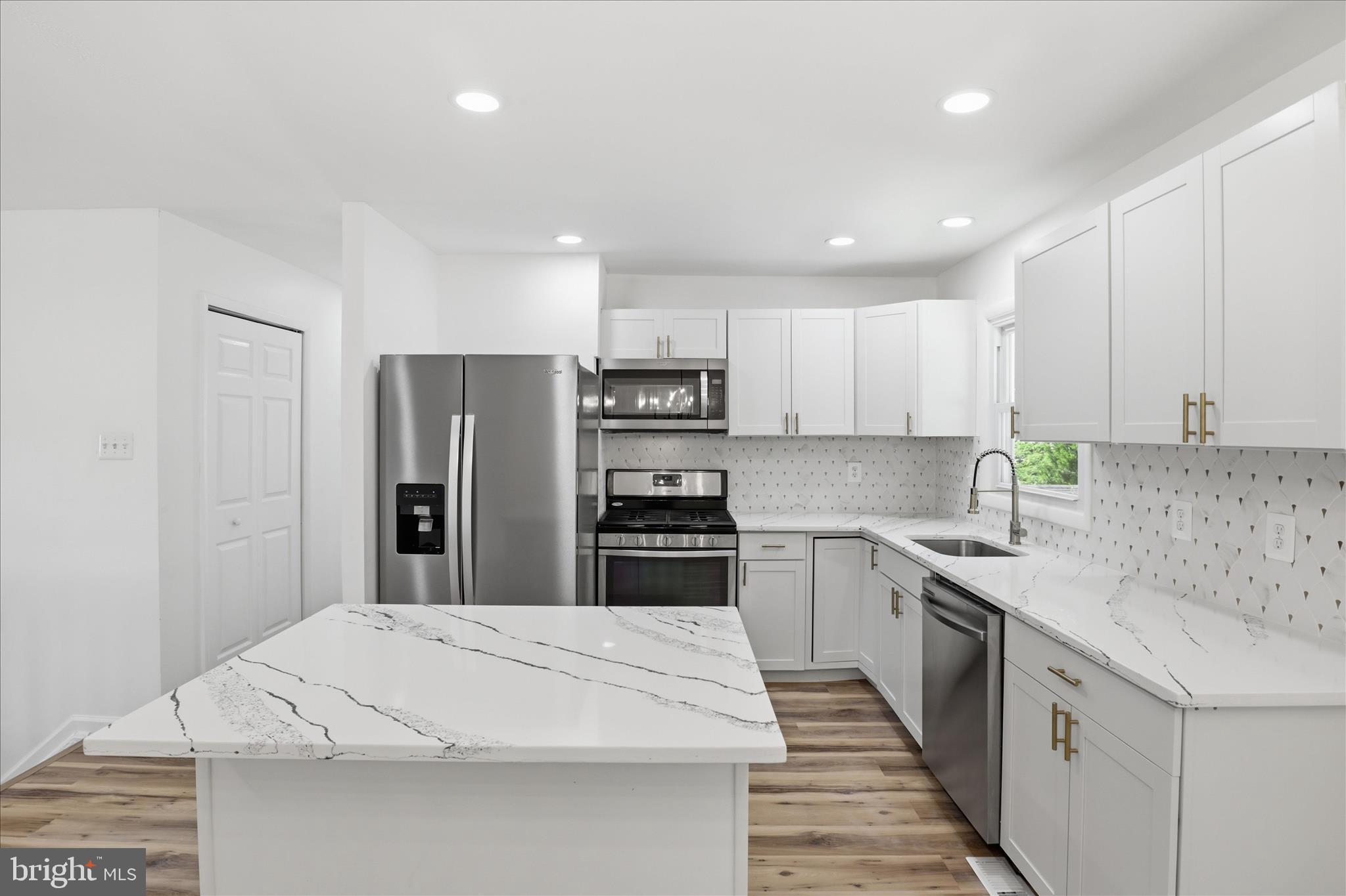 Welcome to 818 Copley Ave! Beautifully fully remodeled home offering the perfect blend of comfort, style, and privacy. This exceptional property features a spacious open-concept layout with recessed lighting throughout, elegant quartz countertops, stainless steel appliances, and a gas stove designed for both everyday living and entertaining. Solar panels provide added energy efficiency and long-term savings. Step outside to your own private retreat featuring a swimming pool, hot tub, and an expansive backyard backing to mature trees, creating a peaceful and private setting rarely found. The oversized driveway accommodates 5+ vehicles in addition to the attached single-car garage, with plenty of additional street parking available for guests and family. The upper level offers 3 generously sized bedrooms and a beautifully updated full bathroom. The lower level includes an additional bedroom, a versatile den ideal for a home office or guest space, and another full bathroom. With a separate private entrance and sliding glass door leading directly to the patio, the lower level offers excellent flexibility for extended family, guests, or potential rental opportunities. Additional recent updates include a newer HVAC system, hot water heater, washer, and dryer, making this home truly move-in ready. Situated on a huge lot with exceptional outdoor space and privacy, this rare property also offers convenient access to shopping, the post office, and public transportation. A wonderful opportunity to own a beautifully updated home in a highly convenient location. The swimming pool and hot tub are in good condition and will convey in "AS IS" condition.