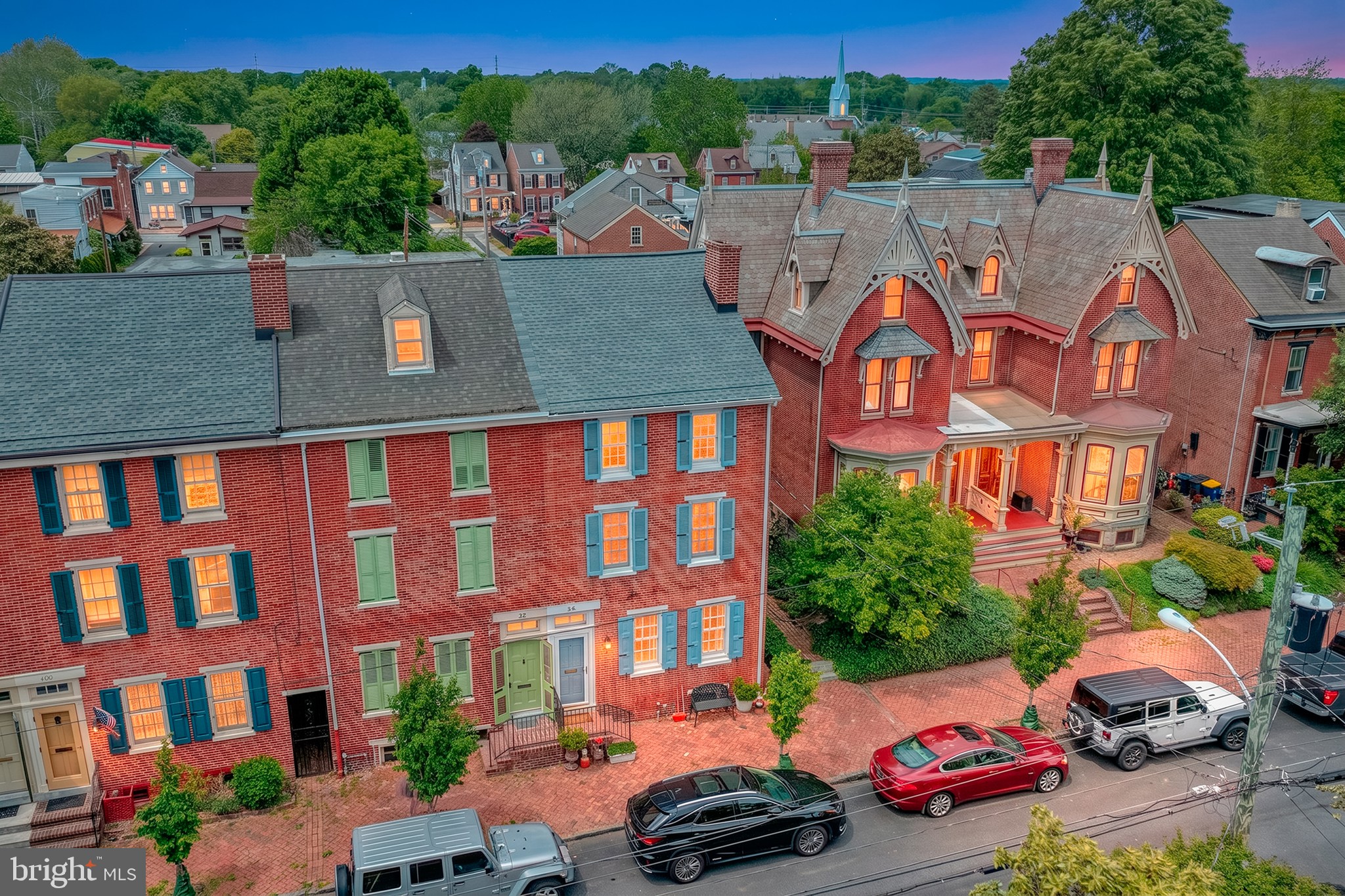 Welcome to this well maintained, brick, end of row townhome in Old New Castle.  This home offers lots of space and a flexible floorplan to meet your needs, whatever they may be.  The main level features a living area with gas fireplace, spacious dining room, a powder room and a remodeled, eat-in kitchen with gas cooking, dishwasher, microwave and plenty of cabinet and counter space.  The second floor has the primary bedroom with walk-in closet, 2nd bedroom with a vaulted ceiling, office or sitting area and a large bathroom with shower and large, jetted tub.  The third floor gives you lots of flexibility.  You can use the space as the 3rd and 4th bedrooms, or a bedroom and another living area. The laundry is also on this level, so no going to the basement.  The 4th floor is finished and can be used for storage or additional living area.  There is also a basement with a high ceiling for storage or workroom.  The exterior is another highlight of this home.  There is a brick patio for outside entertaining or relaxing and a beautifully landscaped yard.  Best of all are the 2 off-street parking spaces, no need to fight for parking!  There is also a shed for storing your bicycles, tools, etc.  The owners spent $50,000 4 years ago to air condition the entire home.  Buy this home and you are only steps away from Battery Park and the Delaware River, wonderful restaurants, shops, museums and walking and bicycling trails.  Schedule you appointment today to see this wonderful home.