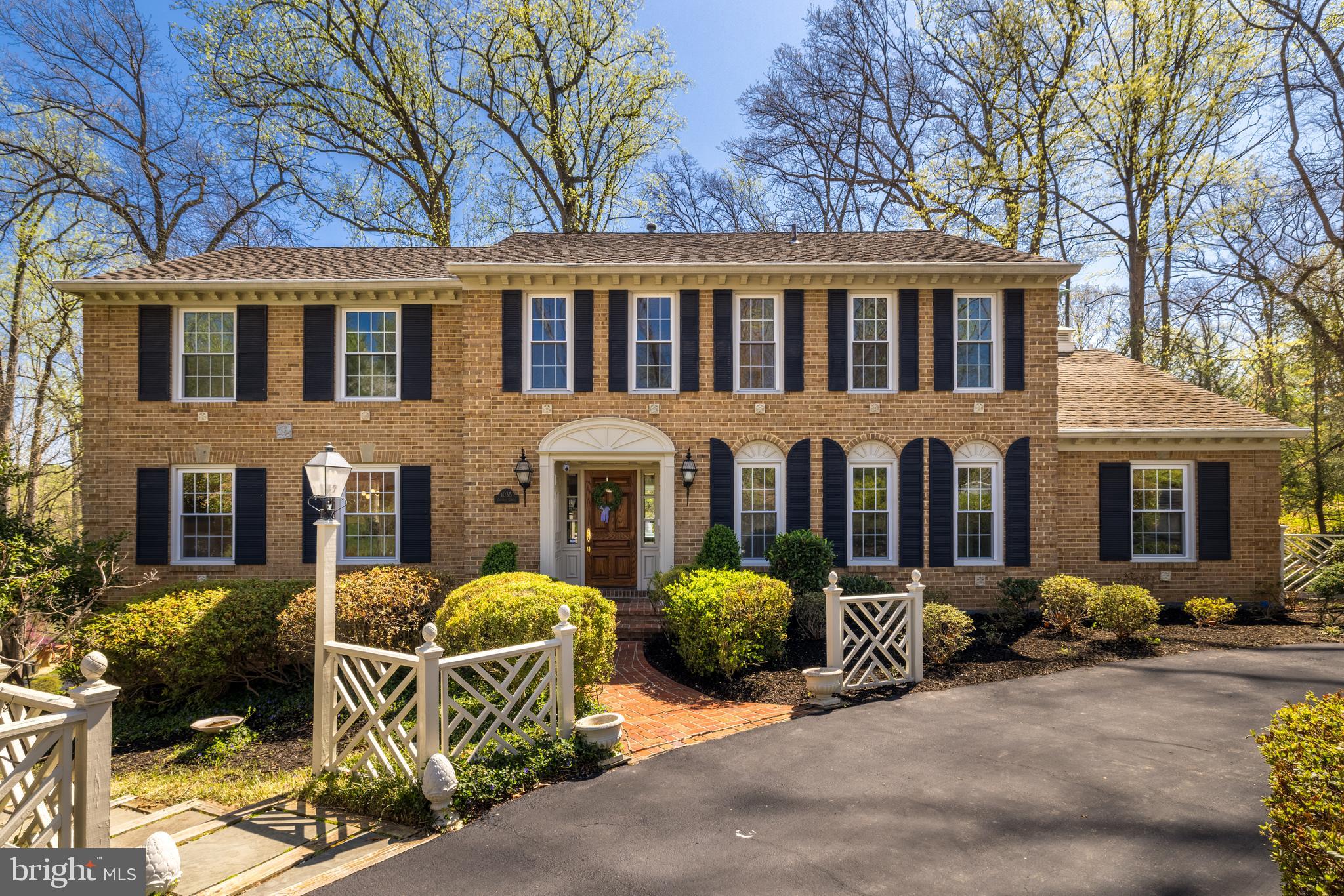 Situated in a quiet, sought-after McLean neighborhood, this elegant brick colonial offers 5 spacious bedrooms, 3.5 bathrooms, and timeless charm with modern updates. Hardwood floors run throughout the home, creating warmth and continuity across the generous living spaces.
The heart of the home is the beautifully updated gourmet kitchen featuring stainless steel appliances, quartz countertops, and a bright breakfast area that opens seamlessly to the inviting family room. Enjoy cozy evenings by the brick gas fireplace or step out to the serene screened-in porch—perfect for relaxing or entertaining. The main level also includes a formal dining room, living room, a private home office, and a stunning den with a beamed ceiling and custom built-ins.
Upstairs, the spacious primary suite offers a walk-in closet and a luxurious bath with double sinks, a soaking tub, and a glass-enclosed shower. Four additional bedrooms as well as a spacious hall bathroom complete this level.
The fully finished  light- filled walk-out lower level provides a large recreation room, a full bathroom, and access to a beautifully landscaped stone patio. The lot features an irrigation system and lush greenery, just a short walk to Scotts Run Nature Preserve.
Enjoy the best of McLean living with easy access to Tysons, I-495, and the GW Parkway. A truly special home offering space, comfort, and an unbeatable location.