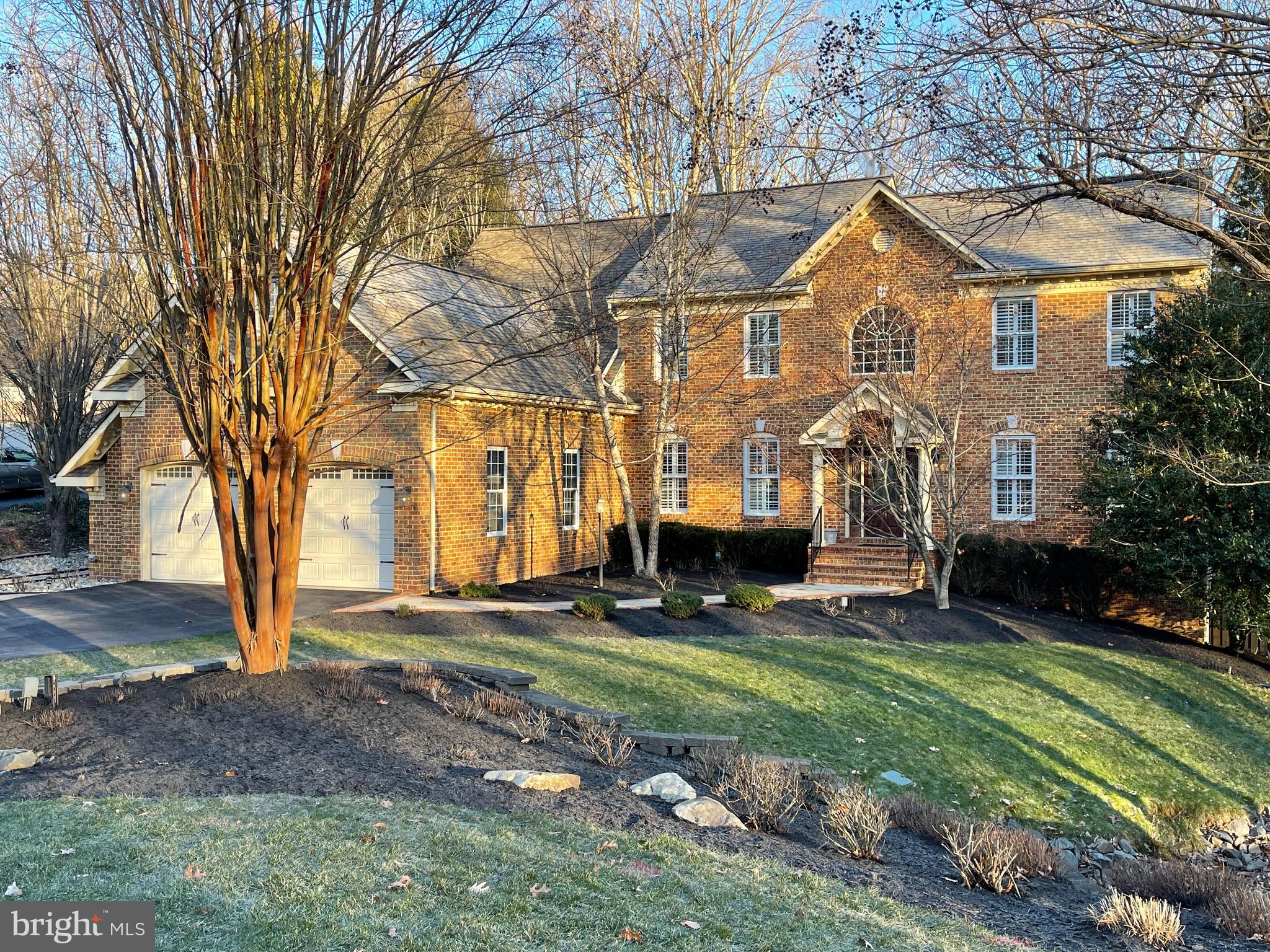 This beautiful home is an absolute dream come true.  Meticulously updated and in impeccable condition, this home has all the bells and whistles and is ready for its new owners.  The main level features a vaulted ceiling in the family room with tons of natural light overlooking mature trees and a gas fireplace.  A spacious living room,  formal dining room with chair rail & shadow boxing.   A gorgeous kitchen with huge pantry, hickory cabinets,  oversized island, SS Appliances, double oven and Live Edge granite.  Main-level office with built-ins and French doors perfect for working from home.  The beautiful hardwood hardwood staircase leads you upstairs where the hardwoods continue throughout the entire upstairs level.  The primary bedroom features a tray ceiling and tons of natural light. There are 3 additional bedrooms on second level and 2 full baths, one being a princess suite.  A large fully finished walkout basement features a family room, game room with a built-in bar, exercise room, craft room, storage room and luxury bath with heat ceramic floors.  Outside is an entertainer's dream backyard. A beautifully landscaped fully fenced backyard,  your very own inground heated pool, a tiki bar with an outdoor kitchen, and an entertainment area. The 1288  sqft front-load garage that holds 3 cars and has an abundance of storage.  The home is situated within the much sought-after Prince William County school district and located convenient to shopping and great for commuting. The TV's, pool table, 6 barstools, some of the exercise equipment and electric fireplace in the basement all convey.