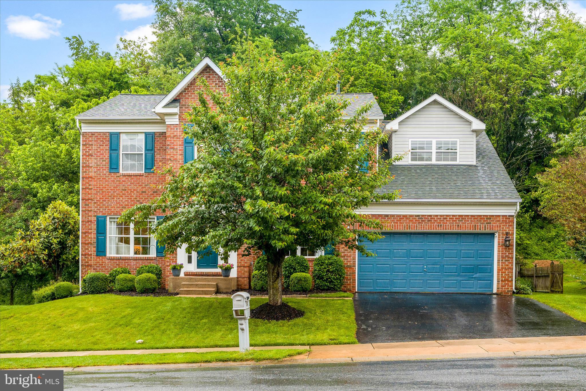 Welcome to 5811 Winding Ridge Way - a beautifully maintained 4-bedroom, 3 full bath, 1 half bath colonial in the peaceful, private Winding Ridge community of Frederick in the Oakdale School District! Step inside to a welcoming entryway with high ceilings and hardwood floors throughout the entire main level, featuring a formal dining room and sitting room at the front of the home that flow seamlessly into an open-concept living area and eat-in kitchen with stainless steel appliances. The kitchen opens to a peaceful sunroom filled with natural light and stunning wooded backyard views, plus a convenient half bath and laundry on the main level. Step out onto the deck to enjoy al fresco meals surrounded by mature trees and the sounds of birds in the fully fenced and beautifully landscaped backyard. Upstairs holds all four bedrooms, including a spacious primary suite with a dedicated office area and updated ensuite bath. The fully finished lower level offers a full bathroom and flexible living space perfect for a home office, gym, or guest suite. Major updates include a new HVAC (2026), new water heater (2026), new roof (2023), new basement carpet, fresh paint throughout, and newly installed deck railings - truly move-in ready! Conveniently located close to I-70, downtown Frederick, Lake Linganore Town Center, and historic New Market — with no city taxes!