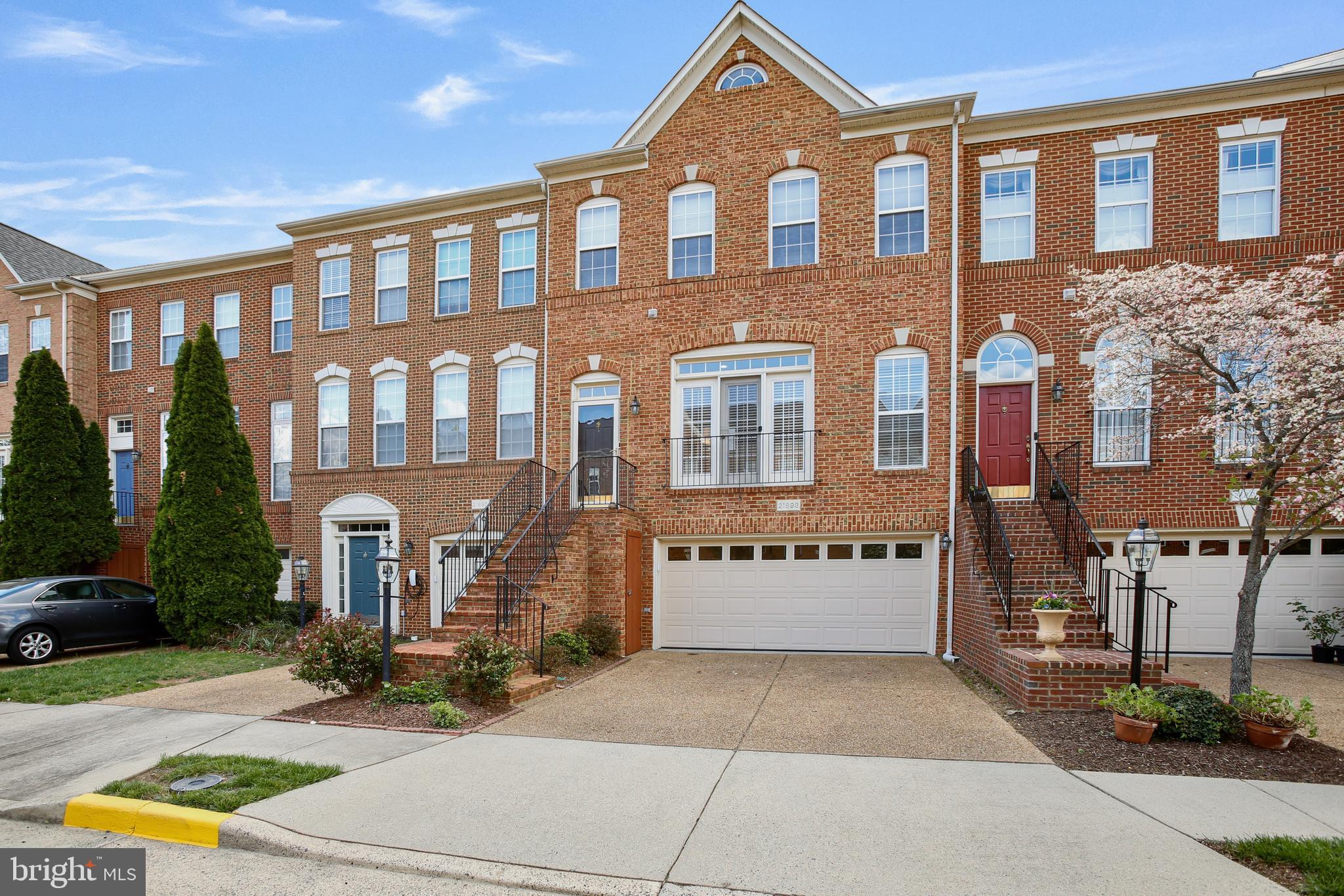 5/24 and 5/25 - Open Houses cancelled
A tremendous opportunity to acquire this stunning home in the Broadlands South community!
Flooded with natural light flowing through the Juliet balcony and large windows, accentuating the beautiful hardwood floors, spacious living room and formal dining room. The new owners will love entering the home into this warm inviting space!  This beautifully maintained, East facing brick front home is situated on a premium lot which backs to woods, with a large composite rear deck to enjoy the tranquil and private setting. This home boasts a 3 level bump out making the total sqft just shy of 3,000! The spacious kitchen features granite counters, island w/cooktop, double oven, plenty of cabinets and pantry. An additional family room is just off the kitchen. The large primary bedroom boasts 3 walk-in closets! The primary bathroom has double sinks, large jacuzzi tub and a  separate shower. Two additional bedrooms, family bath and laundry *updated washer and dryer, complete the upper level. As you head downstairs to the lower level you’re greeted with a large family room/den, a beautifully updated full bathroom, a private office with premium, glazed double doors – perfect for anyone working from home, and a large two car garage with extra storage space. The lower level has access to the fully enclosed yard providing more outdoor space to enjoy, with privacy of the surrounding wooded area. Schedule a private tour or come meet me at the open house! 

The Silver Line at Metro Center Dr is just 5 miles away! Within very close proximity is Mill Run Elementary School and Eagle Ridge Middle Schools. Conveniently located minutes from the Broadlands Village Center where you’ll find plenty of restaurants, coffee shops, grocery stores, post office, LA fitness and much more! Easy access to the Dulles Greenway, route 7 and 28.  The Wonderful Broadlands amenities include the Southern Walk Clubhouse and Pool - the largest pool in Broadlands which is just right around the corner! basic cable and high-speed internet, nature center, tennis/basketball courts and recreational trails are all close by and included in the HOA.