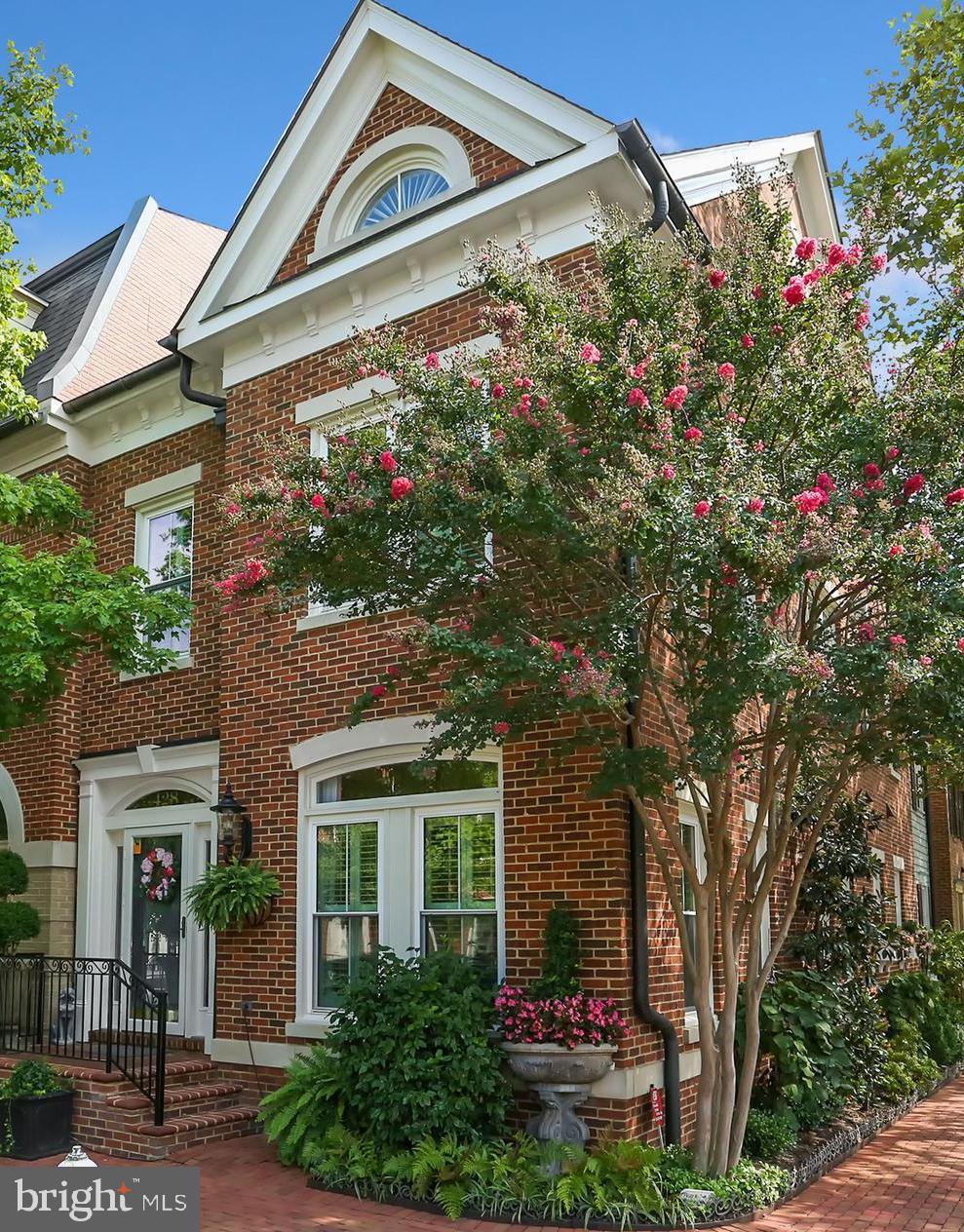 Exquisite 3 bedroom, 4.5 bathroom, 2-car garage, end-unit townhome with rooftop deck is only 4 blocks from the Potomac River and King Street and lives like a single family home! This move-in ready 3944 sq. ft. home has been meticulously cared for with no detail overlooked. The gourmet kitchen features professional grade stainless steel appliances, a pantry, and an oversized center island with plenty of room for cooking, prepping and entertaining. The spa-like master bedroom retreat boasts a freestanding tub, separate frameless glass shower, heated floors, his and hers walk-in closets and a gas fireplace with a custom marble mantel. The spacious open floor plan is perfect for living and dining and features custom built-in shelving, cabinetry, millwork and hardwood floors throughout and 3 gas fireplaces. Other highlights include eat-in kitchen, a dining room, 3 en suite bathrooms, a bedroom-level laundry room, a home office with a built-in desk and bookcases and can also be used as a bonus room. The lower level recreation room comes complete with a gas fireplace and more beautiful built-ins. Triple pane windows on 3 sides of the home allow abundant natural light and keep the home very comfortable and quiet. You'll love stepping directly into your home from your attached 2 car garage. Easy walk to Alexandria's vibrant King Street and the Potomac River, Trader Joes, and Harris Teeter, and minutes to Amazon HQ2, Reagan National Airport, King Street and Braddock Road Metro, truly a commuters dream. Don't miss this one!