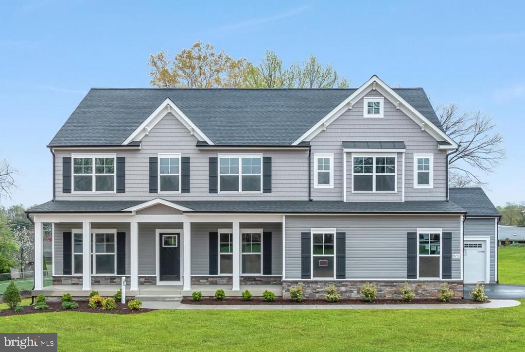 Welcome home to this brand-new SONA Homes Churchill model currently under construction, offering 3,193 finished square feet of thoughtfully designed living space across three levels. Located in King George County on a 2.54-acre homesite

Step inside and discover a main level built for the way you actually live. The heart of the home is an open-concept kitchen featuring 42" soft-close cabinetry, gleaming granite countertops, a center island with bar seating, and a full suite of stainless steel Frigidaire appliances. LVP flooring flows throughout the entire first floor, anchoring the space in warmth and durability. The adjacent dining room impresses with crown molding and two-piece chair molding, while the family room invites relaxation around the 36" fireplace. A private home office and powder room complete the first floor.

Upstairs, the primary suite is designed as a private retreat with walk-in closets and a spa-inspired bath layout. Three additional bedrooms, one with an en suite bath and an additional hall bath round out the upper level.

The basement — already plumbed for a future full bathroom — adds another 1,442 square feet of flexible space ready to grow with you.

Outside, enjoy the curb appeal of stone veneer, cedar shake in the gable, and a craftsman front door, all framed by an architectural 30-year roof. Entertain on the 12×12 rear deck or relax on the full front porch. The 2-car garage is drywalled, painted, and EV-outlet ready — with an upgraded 400-amp electrical service to future-proof the whole home.

 Built with precision and backed by a 2-10 builder warranty (1-year workmanship, 1-year mechanical, 10-year structural), this SONA Homes residence offers lasting peace of mind. Additional incentives include 1% closing-cost assistance when using the builder’s preferred lender.
*Sample photos are from the same floor plan built on another lot and are intended to demonstrate the layout and quality of construction. Actual home may differ in colors, finishes, fixtures, and included features.*
*Some photos have been virtually staged to help illustrate the potential use and layout of the spaces*