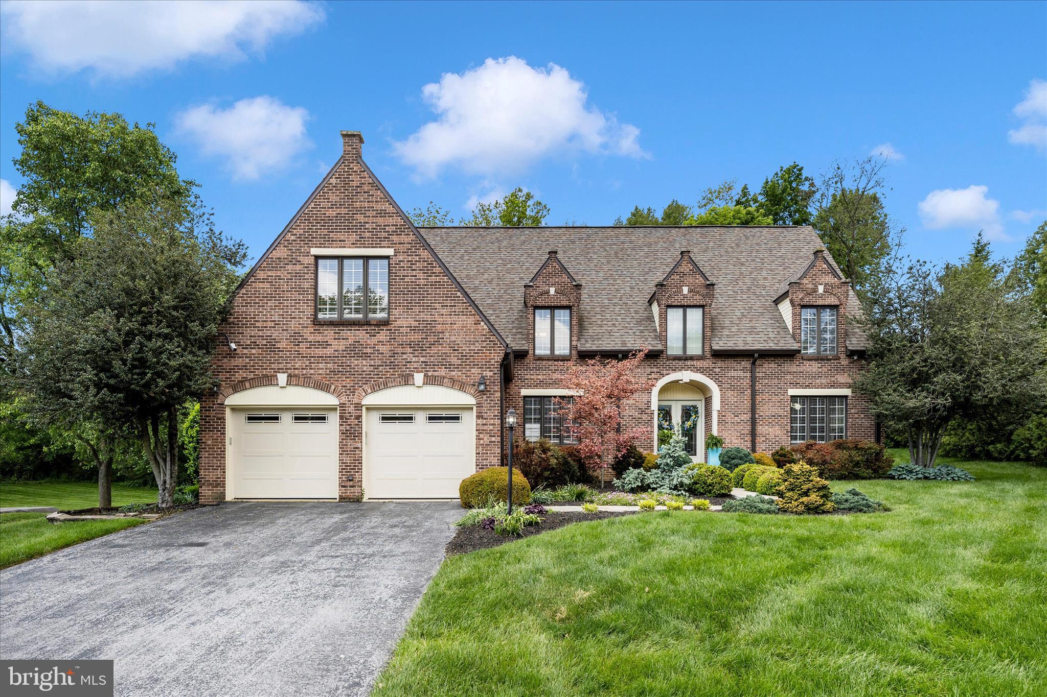 Nestled on a quiet cul-de-sac in the sought after Fountain Head development, this stunning two story brick home offers 4,224 finished above grade square feet on a beautifully landscaped and private 1.15-acre lot. With 4 bedrooms and 3 full baths, this exceptional property combines timeless elegance with thoughtful updates and abundant living space.

The gourmet updated kitchen is designed for both everyday living and entertaining, featuring abundant cabinet space, a large center island, countertop bar seating, and a spacious eat-in area. The kitchen opens directly to a comfortable family room with cathedral  ceilings, creating the perfect gathering space. In addition, the home offers a separate expansive great room and dining area that provide multiple inviting spaces for entertaining and relaxation.

Rich hardwood floors, custom built-ins, and exceptional craftsmanship add warmth and character throughout the home. A dedicated office with built-ins offers the ideal work from home setup, while the oversized laundry/mud room provides extensive storage and functionality. Closet and storage space abound throughout the property.

The luxurious primary suite is a true retreat featuring a walk-in closet, heated bathroom floors, and a spa like bath complete with a soaking tub. The additional bedrooms are all generously sized, offering comfort and flexibility for family, guests, or additional workspace needs.

Step outside to the newly redone rear patio overlooking the serene, private backyard . It’s a beautiful setting for outdoor entertaining or peaceful evenings at home. Additional highlights include natural gas, a newer roof, beautifully maintained landscaping, abundant storage throughout, and countless additional upgrades and amenities.

This is a rare opportunity to own a beautifully updated home in one of the area’s most desirable neighborhoods!
