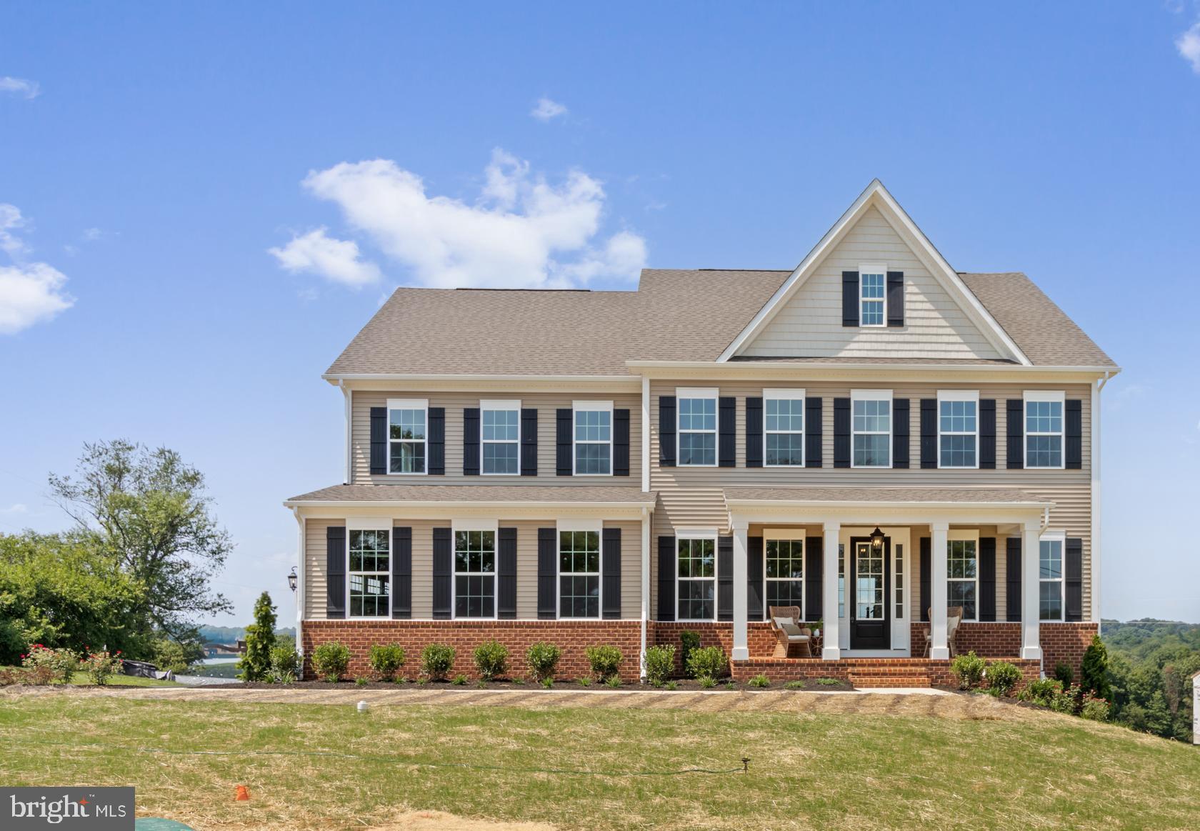 Welcome to your dream home! This stunning, fully completed new construction in Western Howard County is ready for immediate move-in. Offering everything you’ve been looking for in a single-family residence, this property features 5 spacious bedrooms and 5 beautifully designed bathrooms, making a lasting impression from the moment you step inside. The inviting foyer opens to a versatile flex space—perfect as a formal dining room or living area. The open-concept design effortlessly connects the gourmet kitchen, family room, and dining area, making it ideal for both entertaining and everyday living. In the kitchen, you’ll find 42" cushion-close cabinets, a striking designer hood vent, a massive 10' island with mitered-edge Quartz countertops, and premium GE Profile stainless steel appliances. The oversized 2-car garage connects to a convenient mudroom/arrival center, leading to a full bath and a private study or potential 5th bedroom. Upstairs, retreat to the owner's suite, featuring two generous walk-in closets and a spa-like bath with dual vanities, a soaking tub, and a walk-in frameless glass shower. Each secondary bedroom is equally impressive, complete with walk-in closets and bath access. The finished lower level offers even more living space, with a full bath, ground-level walkout, and plenty of storage. This home combines luxury, comfort, and functionality in perfect harmony!