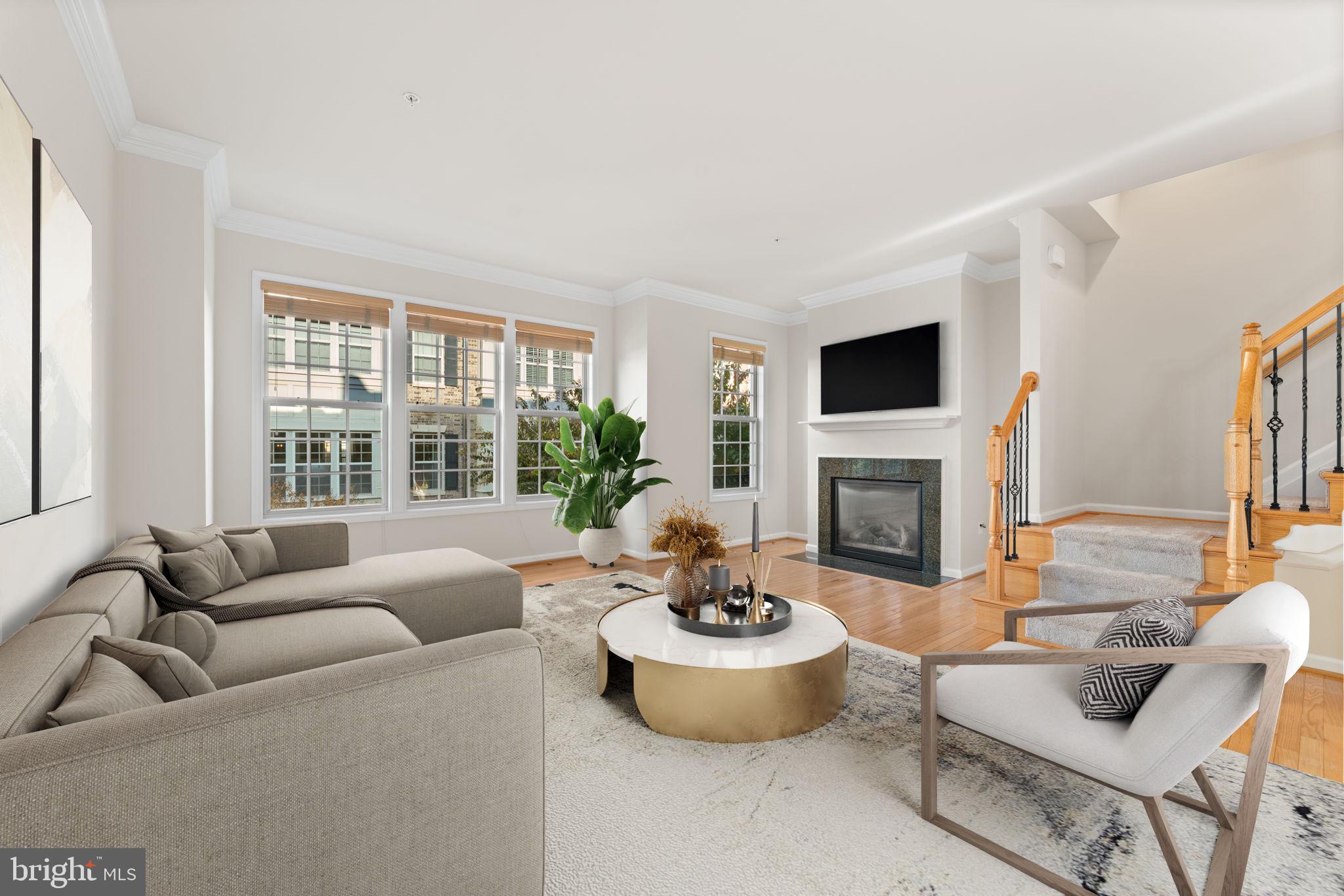 Discover refined living at 602 Overlook Park Drive, a sophisticated 4-level luxury townhome nestled within National Harbor’s prestigious gated community. This immaculate residence blends elegance, comfort, and elevated design with 3 bedrooms, 3 full baths, 2 half baths, and a 2-car garage with additional 2-car driveway, offering an exceptional living experience just minutes from the water’s edge.
Graced with 9-foot ceilings and flooded with natural light, this home boasts exquisite hardwood floors, new carpet, and seamless indoor–outdoor living—perfect for both intimate everyday living and memorable entertaining. The Entry level flex space is ideal as a home office, den, fitness room, or guest lounge with a half bath and two closets.  Enter from the front door or the garage with ease.

Main Living Level
An open and airy layout sets the stage for luxury living. The spacious living and dining areas feature rich hardwood flooring, a cozy gas fireplace, and an effortless flow into the gourmet kitchen. Designed for the inspired chef, the kitchen showcases stainless steel appliances, double wall ovens, gas cooking,  an abundance of refined cabinetry, a charming breakfast nook—ideal for morning coffee or evening wine.

The elegant Owner’s Suite offers a luxurious sanctuary with space for a king-sized bed set.  Custom-built walk-in closet, and a spa-inspired en-suite bath featuring dual sinks, upgraded cabinetry, and an oversized linen closet. A second bedroom with a private full bath and walk-in closet provides comfort for family or guests. The laundry room on the bedroom level adds everyday convenience.

Entertainer’s Top Level – A Showpiece
Third bedroom with a full bath on this level enhances comfort for guests.
The 4th level loft transforms into an elevated entertaining oasis, complete with a wet bar with sink, wine refrigerator, and a second stainless-steel dishwasher. Step onto the private terrace and indulge in breathtaking views of the Potomac River and the Woodrow Wilson Bridge—an unforgettable setting for sunset cocktails, weekend gatherings, fireworks, or quiet evenings under the stars. 

Additional Highlights & Lifestyle Amenities
• Freshly painted interior with premium finishes and new carpet.
• Community courtyard retreat with stone-facing fire pit and seating
• Two dog parks within the community
• Prime location minutes to DC, Old Town Alexandria, Reagan National Airport, MGM, Tanger Outlets, the Gaylord Convention Center, and waterfront attractions including the Capital Wheel.
• Close proximity to Joint Base Andrews , Joint Base Anacostia-Bolling and National Airport

This exceptional residence offers a rare blend of luxury, tranquility, and urban convenience—perfect for discerning buyers seeking a refined National Harbor lifestyle in a secure, amenity-rich community.