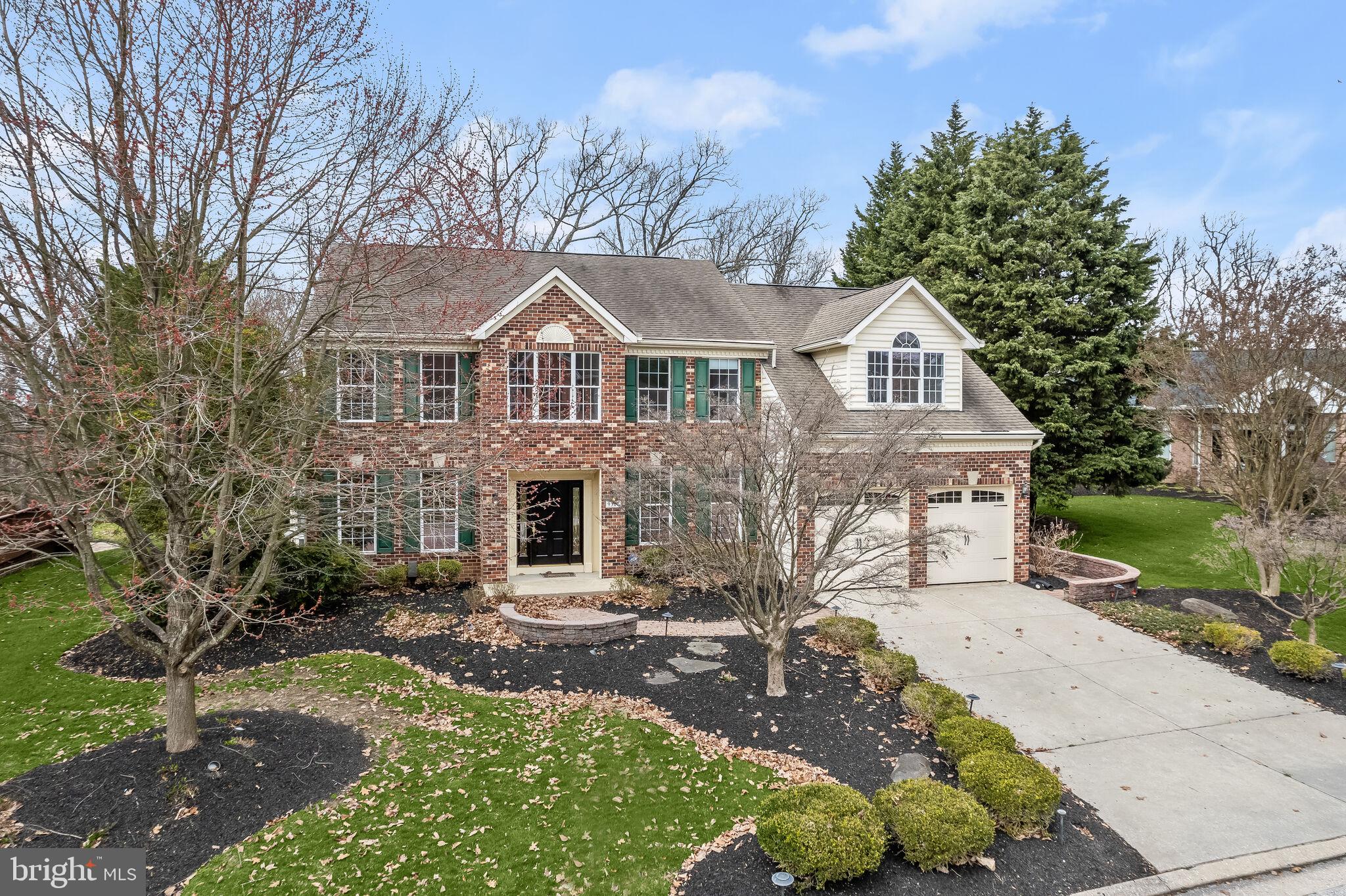 Experience luxury living in this exquisite 6-bedroom, 4.5-bathroom brick Colonial nestled in the highly sought-after Cromwell Woods community of Parkville. Upon entering, the elegant 2-story ceiling foyer sets the tone, leading with rich hardwood floors and a pleasing neutral color palette that flows seamlessly throughout the home.  The sunny living room boasts a bay window and crown molding, while the formal dining room features elegant crown molding and chair railing. The impressive family room, with its soaring cathedral ceiling, Palladian-style windows, plush carpet, and gas fireplace, serves as the heart of the home and offers access to the deck with cozy pergolas.  The gourmet eat-in kitchen is a chef's dream, featuring granite counters, soft-close 42” cabinetry, a stunning backsplash, a 5-burner gas cooktop, and a double-wall oven. The kitchen island, planning station plus adjacent room ideal as a butler's pantry provide ample storage. Head down the hallway to the bedroom suite with an attached bath, closet with an organization system, and private walk-out to the deck provides convenient main-level living. Garage access and a powder room complete this expansive level. Ascend to the upper-level mezzanine-inspired landing overlooking the family room to the generously sized primary bedroom suite complemented by plush carpet, sitting area with a cathedral ceiling thoughtfully placed in front of Palladian windows offering plenty of natural light, multiple closets with organization system and shelving including a secured entry closet for your valuables. The en-suite bath is the epitome of luxury with its empress green tile work, jetted soaking tub, separate glass-enclosed shower, and double sink vanity. Adding to the glory of this upper level are 4 additional bedrooms and a full bath Let the fun begin in the lower level featuring the recreation room with a bar keeping those refreshments handy before engaging in a friendly game of pool in the billiards room or special movie nights in the media room. The vast laundry room, utility storage room with built-in shelving, and full bath round out this wonderfully flexible lower level. Indulge in plenty of outdoor activities at Cromwell Valley Park and Loch Raven Reservoir or enjoy the plethora of shopping and restaurants close by. Major commuter routes include I-95, I-695, and I-83.  Note:  Some interior photos have been virtually staged.