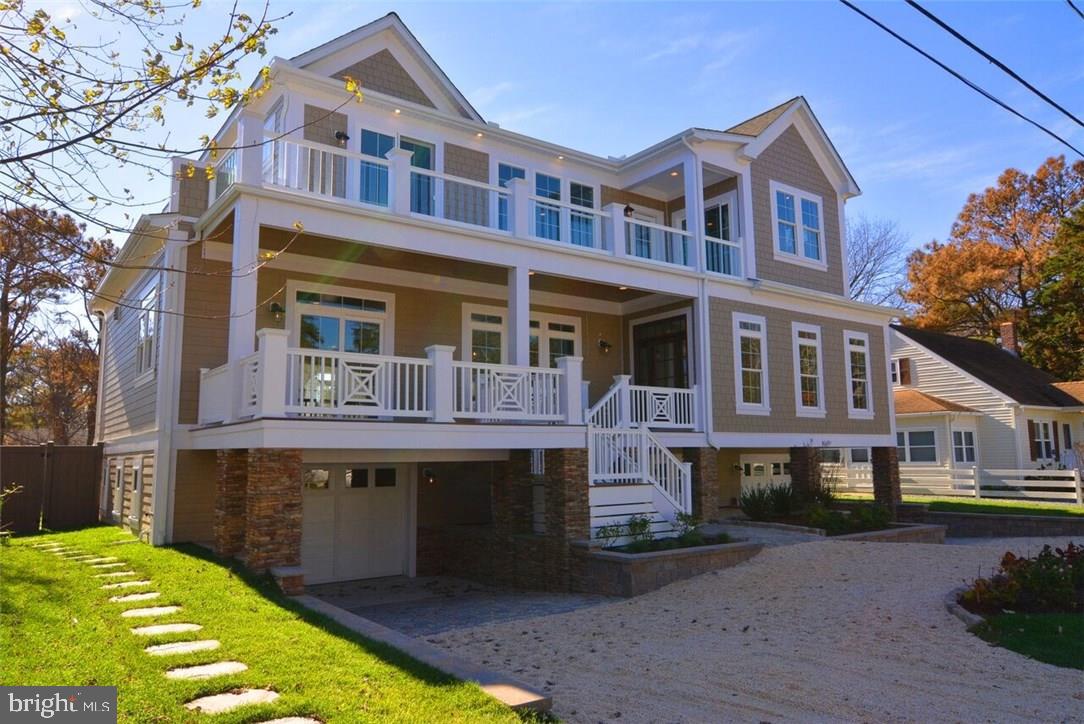MORE FOR THE MONEY AND THE BEST BEACH -Almost Private Beach/locals secret in Rehoboth By the Sea. A true retreat with no detail overlooked. Some ocean views with 4 decks, 3 living areas, Large gourmet kitchen & custom designed baths, whole house audio inside & out, Home theater with surround sound hidden in custom art work over fireplace, wood detail elevator, 2 laundry areas, 3 car garage, 6 bedrooms (3 master suites), wide plank hardwood flooring, quartz and granite counters, random width custom ceiling in kitchen, custom column detail & wanes coating, large scale specialty moldings and trims throughout, custom lighting, smart house with high level security system, screened porch, in ground concrete pool with paver patio in private fenced yard. custom landscaping, irrigation. Built on over sized (1 1/2 lot size) high lot-no flood insurance needed.5011 heated sq ft, 225 sq ft.screened porch, 1078 sq ft decking, 1200 sq ft paver patio, 939 sq ft garage-LUXURY LIVING & Entertaining...