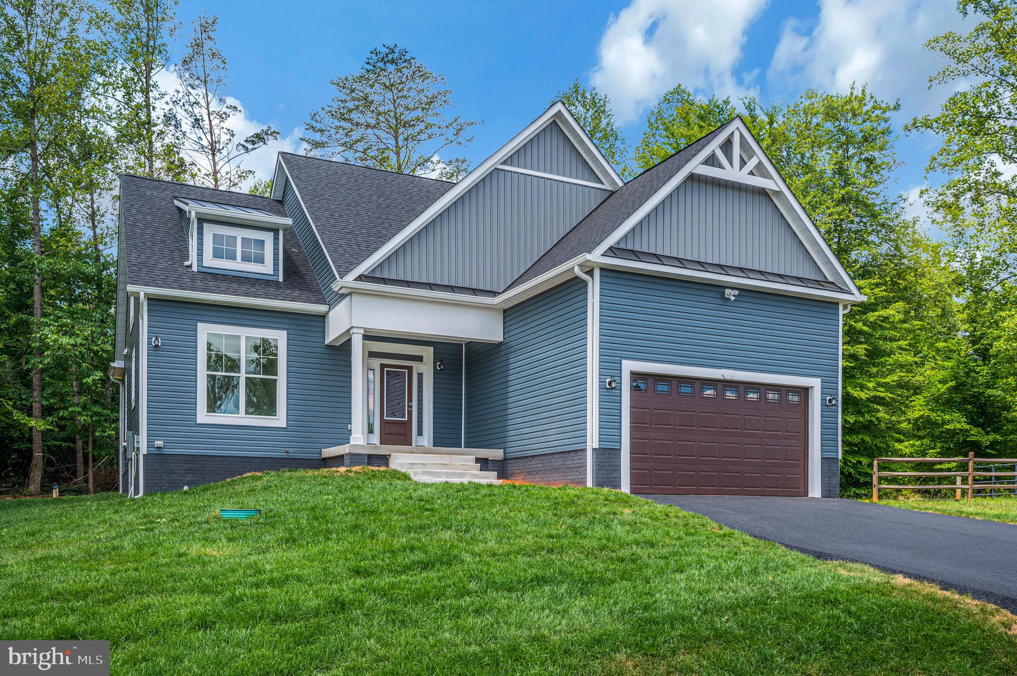 Set an appointment and come visit the Sunset Model in Rock Island, your professional team can help create the perfect floor plan for your needs and lifestyle and control your budget. Build your dream home on one of the rare water-view lots in Rock Island Landing! This to-be-built custom home offers the opportunity to create a one-of-a-kind retreat with panoramic views of Lake Anna from the walk-out basement and rear of the home. Take a very short golf cart ride to your assigned covered boat slip and enjoy easy access to everything lake life has to offer.

Bring your vision to life by selecting from available floor plans or designing a completely custom layout to fit your lifestyle. Personalize finishes, features, and spaces to create the perfect full-time residence or weekend getaway. Whether you envision expansive outdoor entertaining areas, walls of windows overlooking the lake, a luxury owner's suite, or a custom lower-level recreation space, the possibilities are endless.

Don't miss this rare opportunity to build your own oasis in one of Lake Anna's most desirable waterfront communities. Let your imagination take over and create the home you've always dreamed of.

*Pictures of completed builds shown.*