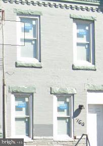 This building features communal living areas, including a newly renovated kitchen with ample cabinet space to fulfill all storage needs. This property has three bedrooms, all with private bathrooms, laminate floors, and good size closets on the second floor. The basement also contains extra storage space, creating ease of organization and storage for all needs. This house could be used as a co-living investment property or easily converted to a single-family residence.