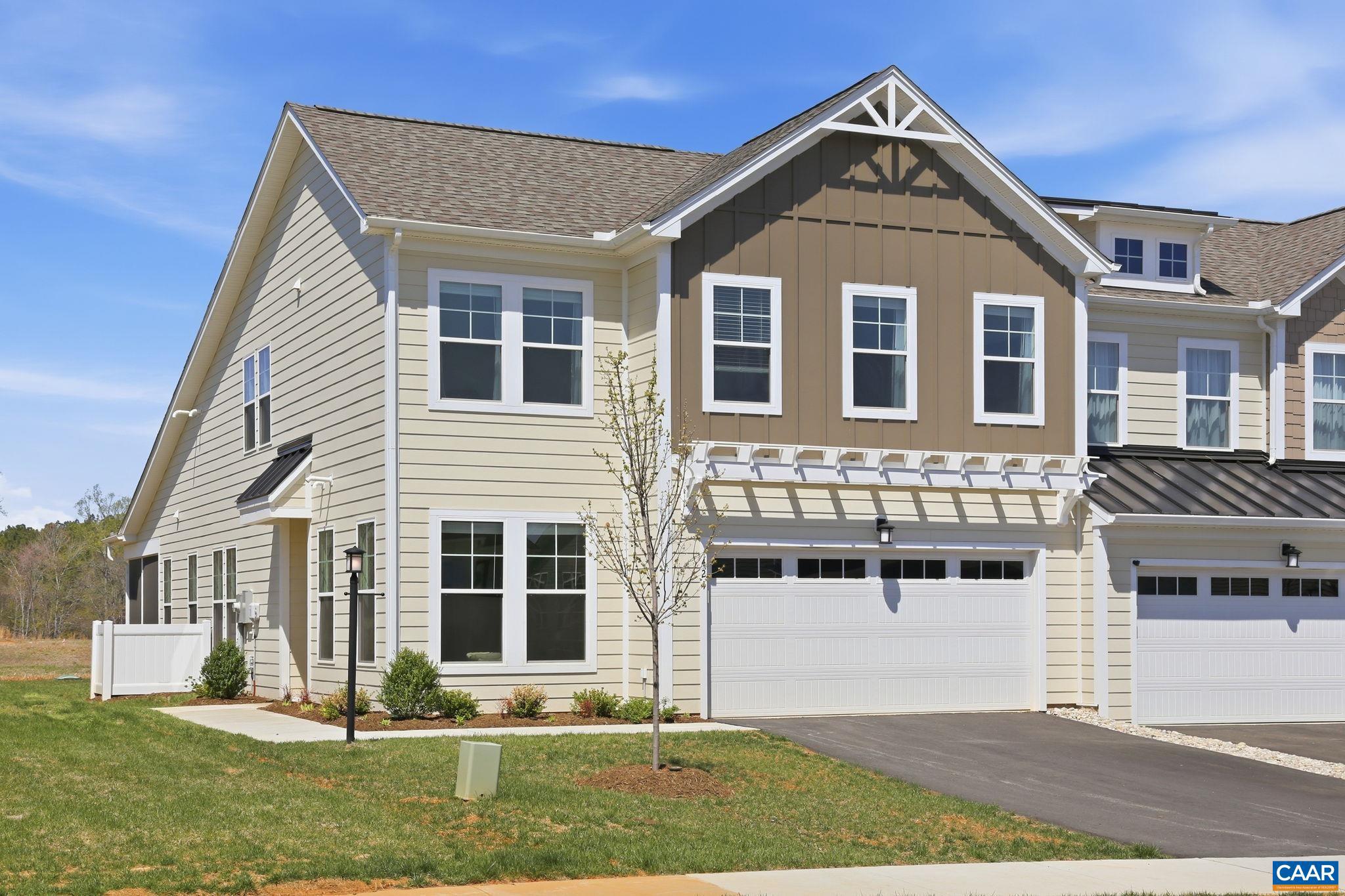 Compelling PRICE ADJUSTMENT + $5,000 offered towards purchaser closing costs with acceptable offer. Truly maintenance-free Spring Creek end-unit townhome is just 5 minutes from I-64 and midway between Charlottesville and Short Pump/Richmond. Open-concept, 3 bed, 2.5 baths, this gracious design combines the opportunity for accessible, single-level living with an additional open concept design upstairs. First floor primary suite washed in light, spa-like en-suite bath with walk-in shower, dual sinks and vanities, and a spacious walk-in closet. True gourmet kitchen with gas range, smart fridge, and separate pantry area spills into a light-filled dining- and living room anchored by an inviting shiplap accented fireplace and a large, screened-in back porch. Upstairs, a loft-like family room parallels generously sized 2nd and 3rd bedrooms, each with walk-in closets. A shared Jack-and-Jill bathroom includes 2 inner doors for privacy. Remarkable! Thoughtful design meets sophisticated finishes meets comfortable, contemporary living for every generation. Built in 2024 by Cornerstone Homes. MOVE-IN READY.,Quartz Counter,Fireplace in Living Room