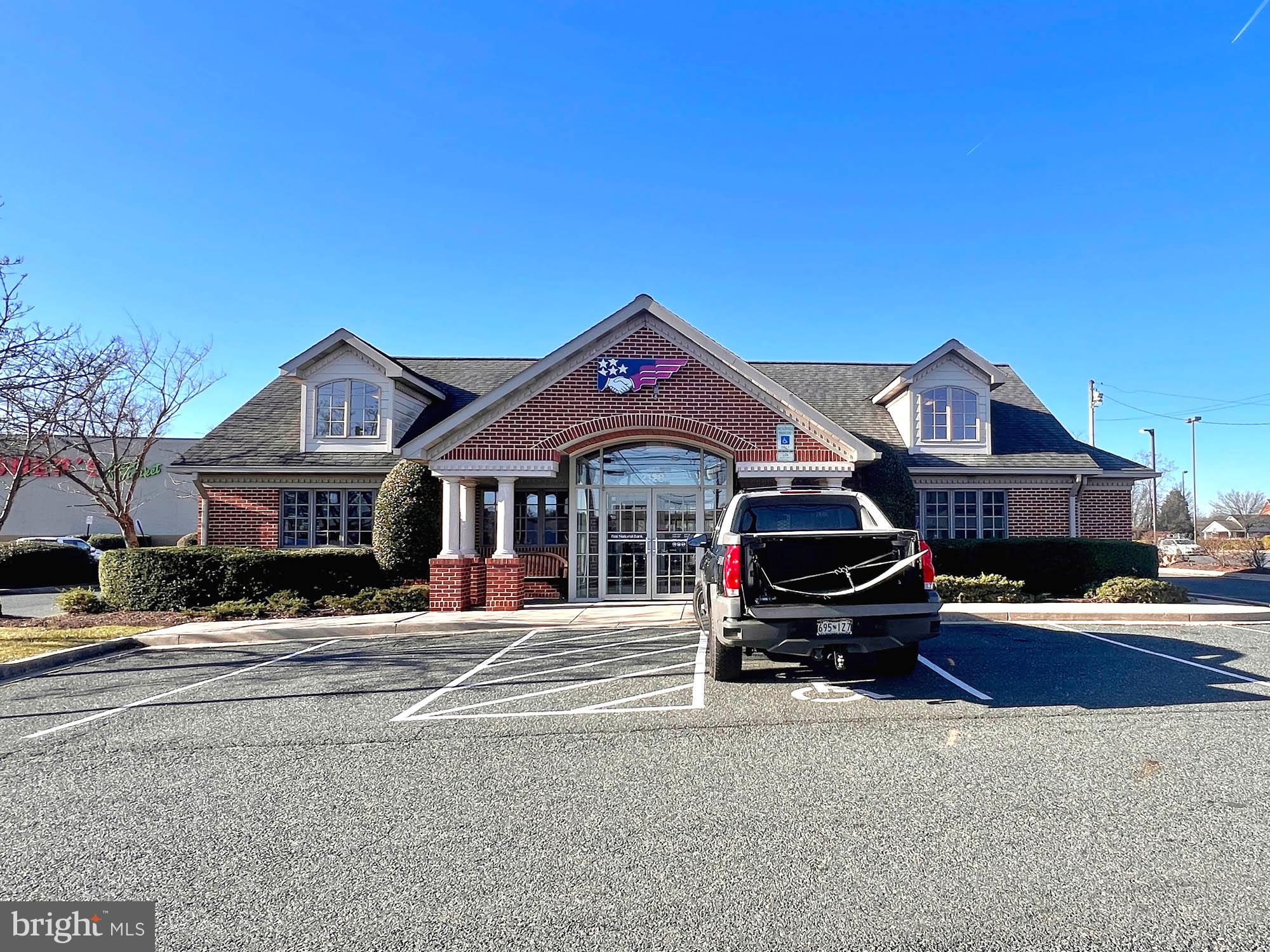 REAL ESTATE AUCTION featuring ON SITE and SIMULCAST ONLINE BIDDING!! Online Bidding Opens - Monday, January 29, 2023. Live On Site Auction - Thursday, February 1, 2024 at 11: 15 AM. List price is opening bid only. $100,000 deposit, payable by cashier’s check or wire, will be required of all online bidders prior to the start of the live auction.

The property is situated in the Bel Air area of central Harford County, along the south side of North Fountain Green Road Road, between the Hickory/Belair Bypass (US-1) and Conowingo Road. The site is located at the front of the Hickory Village Center, a retail development containing a Redner’s grocery store and Burger King, and is bordered by independent restaurants and other businesses. Daily traffic counts (AADT) are 7,491 cars on N. Fountain Green Road, 11,973 cars on Conowingo Road and 23,443 Hickory/Belair Bypass, according to MDOT online mapping. The immediate area is a mixture of community service businesses, surrounded by extensive residential development. Downtown Bel Air is about thee miles south of the site.

Rental Info: Triple net ground lease to Baltimore County Savings Bank, now First National Bank, dated May 28, 1998. The current lease is in the first five-year extension period, running through January 2025, with an annual rent of $83,952.36 NNN. There are 3 remaining five-year options at increased rentals. The extension beginning 2/1/2025 has an annual rent of $96,545.16 NNN. Tenant pays for all maintenance, insurance and annual real estate taxes.