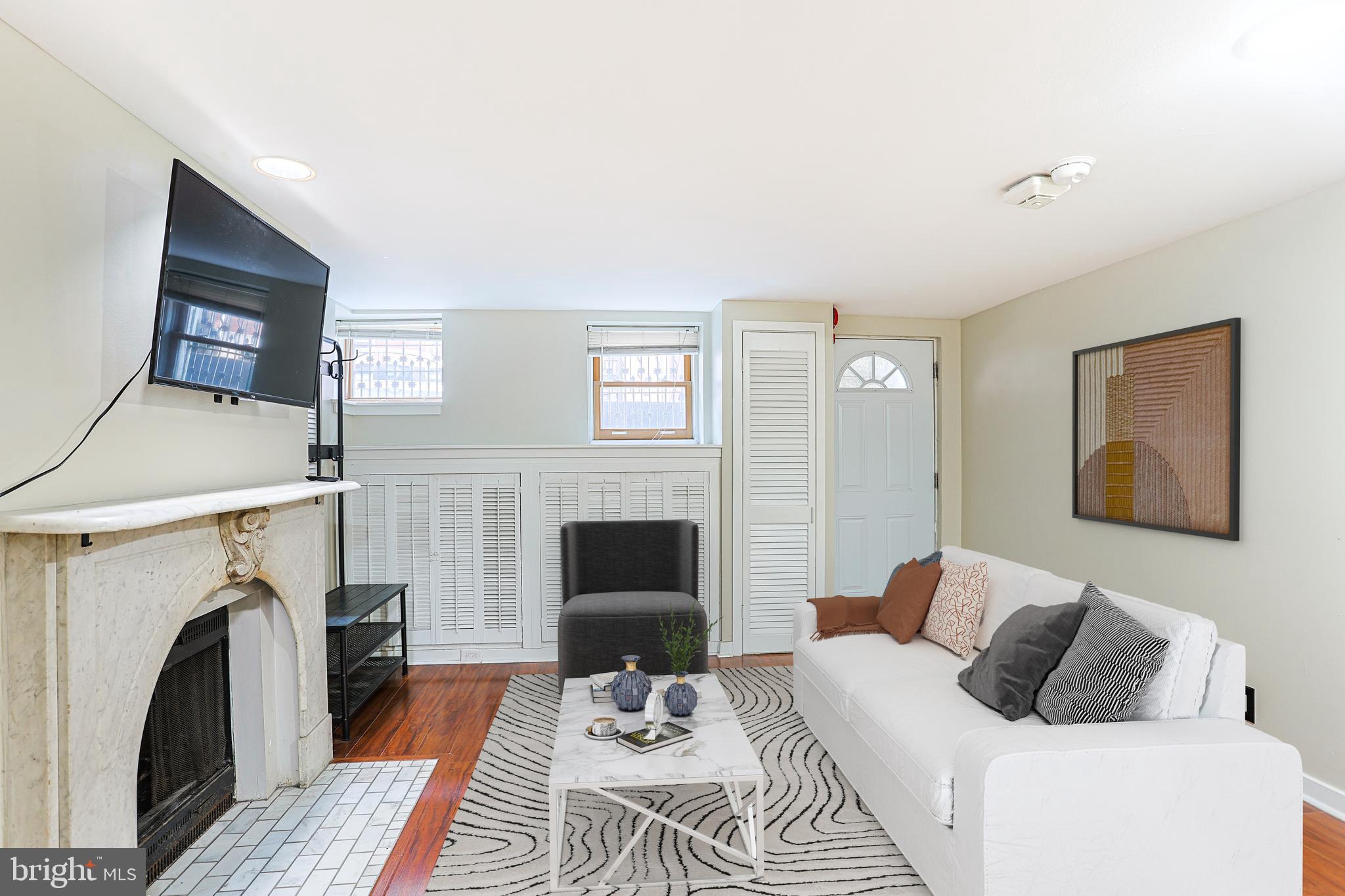 Welcome to 1017 Spruce Street, Unit A, a lovely 1-bedroom 1-bathroom condo. Located in the heart of Washington Square West, this delightful condo offers the perfect combination of comfort and convenience. As you enter, you’re greeted by a spacious living and dining area featuring beautiful hardwood floors and a cozy marble fireplace—ideal for relaxing or entertaining.The kitchen seamlessly connects to the living area through a convenient passthrough window, creating an open and airy feel. The kitchen boasts sleek granite countertops, providing both style and functionality for all your culinary needs. Tucked away from the main living space, you’ll find the full bathroom with a generously sized stall shower. Beyond the bathroom, the quiet, private bedroom offers a peaceful retreat with a closet. One of the standout features of this condo is its private entrance, separate from the rest of the building, providing added privacy and convenience. With an unbeatable location, with a walking score of 99, a transit score of 100, and a bike score of 90, you are just steps from some of the city’s best restaurants and only one block from Thomas Jefferson University Hospital. You’ll have the best of Center City right at your doorstep! Don’t miss your chance to own this cozy condo in a prime Philadelphia location—schedule your tour today!