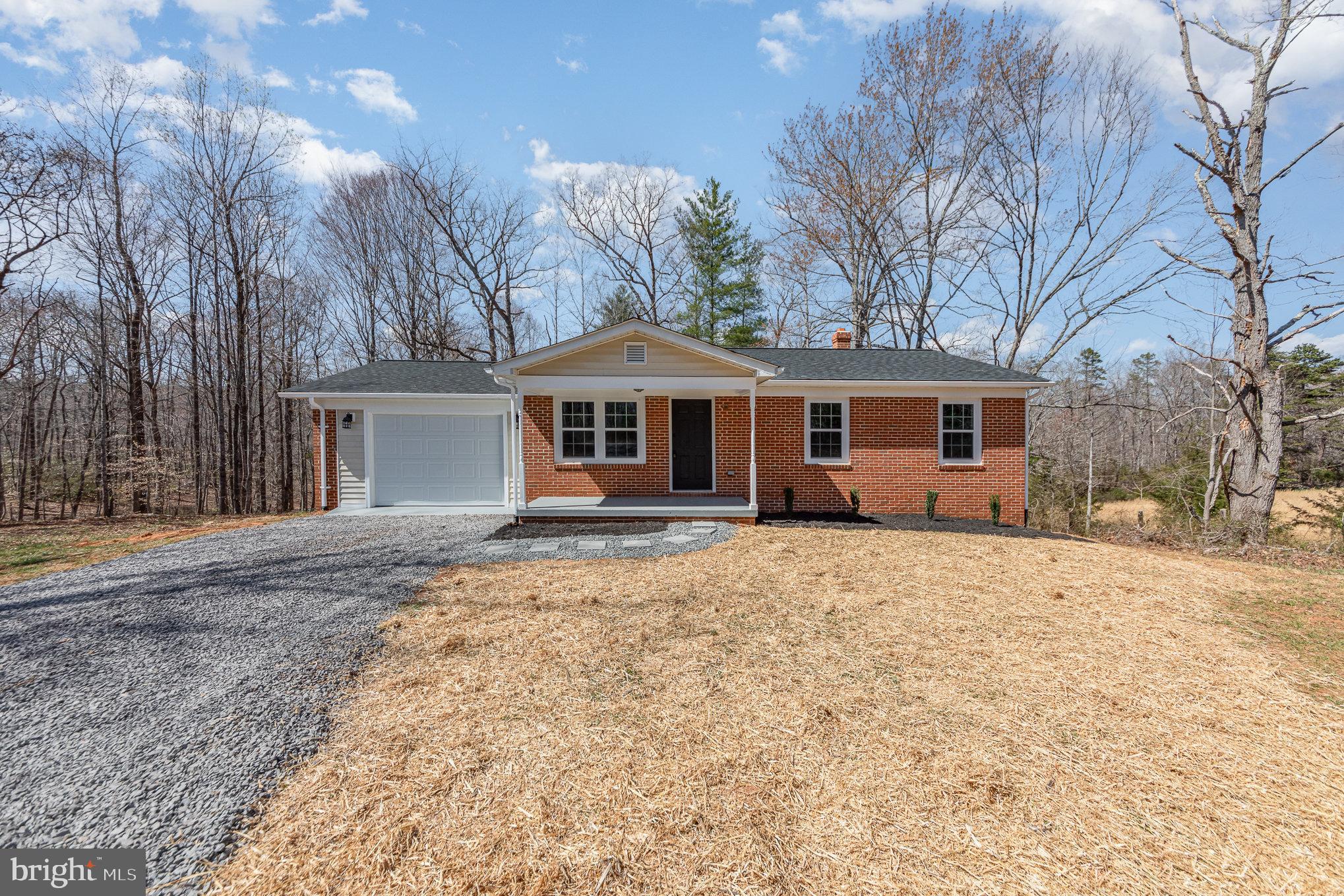 Check out this newly remodeled brick rambler located in Madison County! It features 3 bedrooms, 1 full bathroom, an unfinished basement, and a 1-car garage. The home includes new HVAC, new flooring, new cabinets, new appliances, a new roof, new windows, and a new driveway. It's conveniently situated near wineries, Ruckersville, Gordonsville, and the Town of Madison!