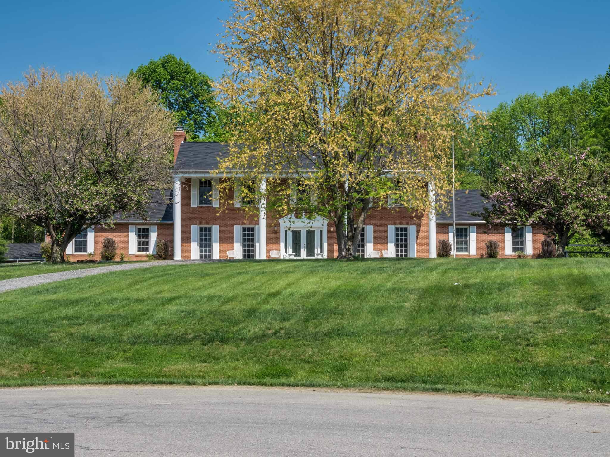 Home rest on over 3 acres w/ 4 car detached & 2 car attached garage.Fabulous kitchen w/silestone countertops, huge island, butlers pantry & breakfast is perfect for your pickiest chef. A wing of the house is a separate in-law house w/full kitchen, hot tub & much more. Features include 2 fireplaces, inground pool, outdoor kitchen,lg.family room, separate living & dining areas, built-in cabinetry+++