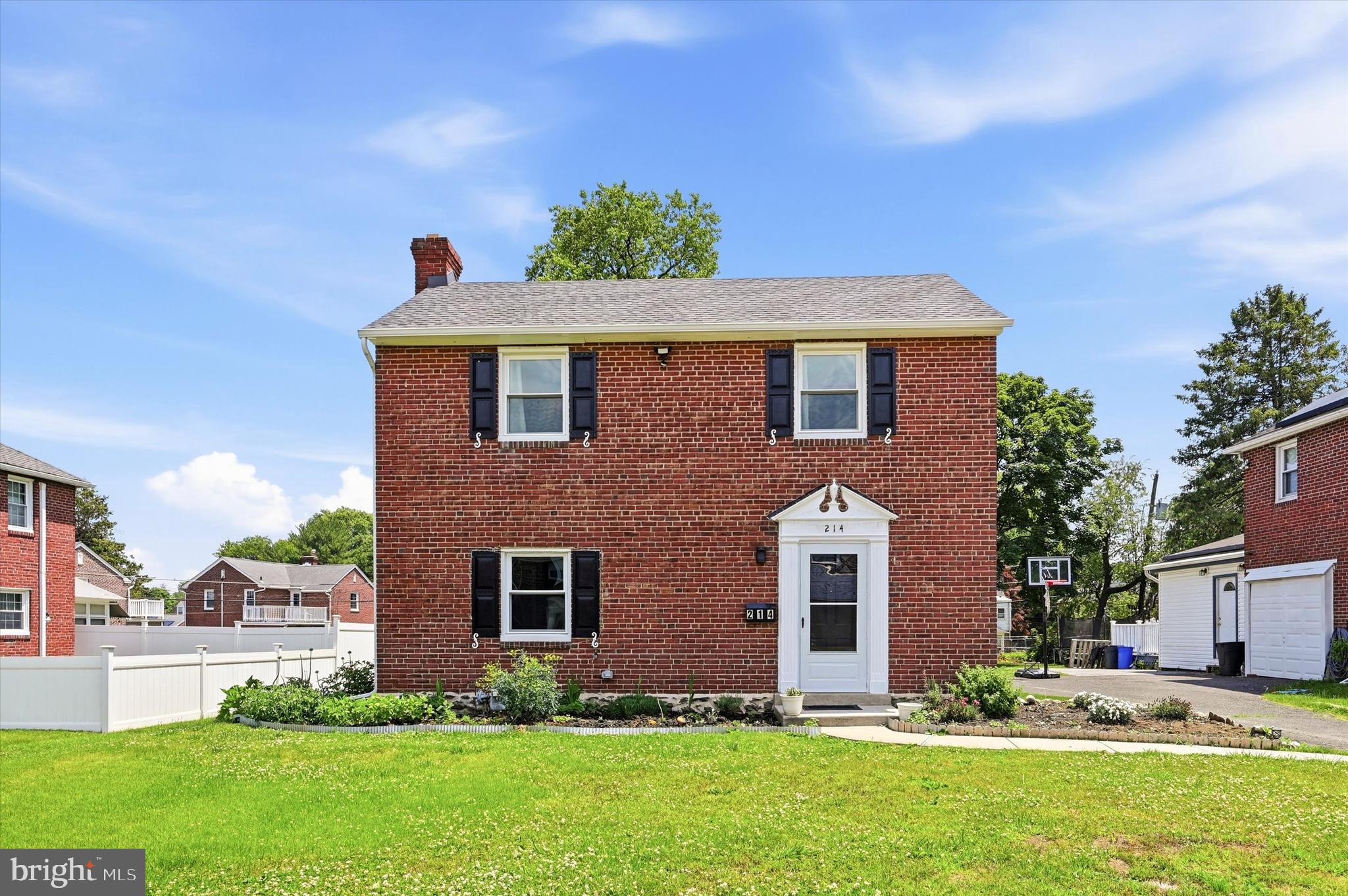 Welcome to 214 Priscilla Avenue in the heart of Aldan Borough, proudly known as "The Community of Homes." This beautifully renovated brick Colonial combines classic charm with modern updates and is ready for its next owner.

Enter into a spacious living room and formal dining room featuring brand-new flooring, creating a warm and inviting atmosphere. The stunning 2024 remodeled kitchen is the centerpiece of the home, showcasing elegant quartz countertops, a stylish tile backsplash, new wood cabinetry with a convenient lazy Susan, and a Whirlpool appliance package. Just off the kitchen is a versatile garage conversion that can serve as a family room, den, home office, or laundry area. This flexible space includes laundry hookups, a full bathroom with a shower stall, and access to the screened rear porch.

Outdoor living is a delight with a screened porch overlooking a rear patio, perfect for grilling, entertaining, or simply relaxing. The expansive, level backyard spans approximately 9,583 square feet and offers endless possibilities for recreation, gardening, or future enhancements.

The second floor features three generously sized bedrooms with ample closet space, a full hall bathroom, and a rear utility room ideal for additional storage, a home office, or seasonal organization. From this room, step out onto a private balcony overlooking the backyard. A walk-up attic provides even more convenient storage space.

The finished lower level adds valuable living space with a recreation room, utility room, laundry area, and powder room.

This meticulously maintained home has benefited from approximately $120,000 in recent improvements, including a new main roof (2021), new kitchen roof (2024), 14 replacement vinyl windows, updated electrical service, and extensive renovations throughout, offering peace of mind and modern comfort.

Ideally located for commuters, the property is just minutes from the Clifton-Aldan train station, Center City Philadelphia, Philadelphia International Airport, and the South Philadelphia Sports Complex. Easy access to public transportation, I-95, and Route 476 makes traveling throughout the region effortless.

Enjoy all that Aldan has to offer, including nearby parks, playgrounds, tennis courts, recreational fields, shopping, dining, and local favorites such as the historic Colonial Playhouse. This move-in-ready home offers the perfect blend of character, updates, convenience, and location.

Don't miss this exceptional opportunity to own a beautifully updated Colonial in one of Delaware County's most desirable communities.