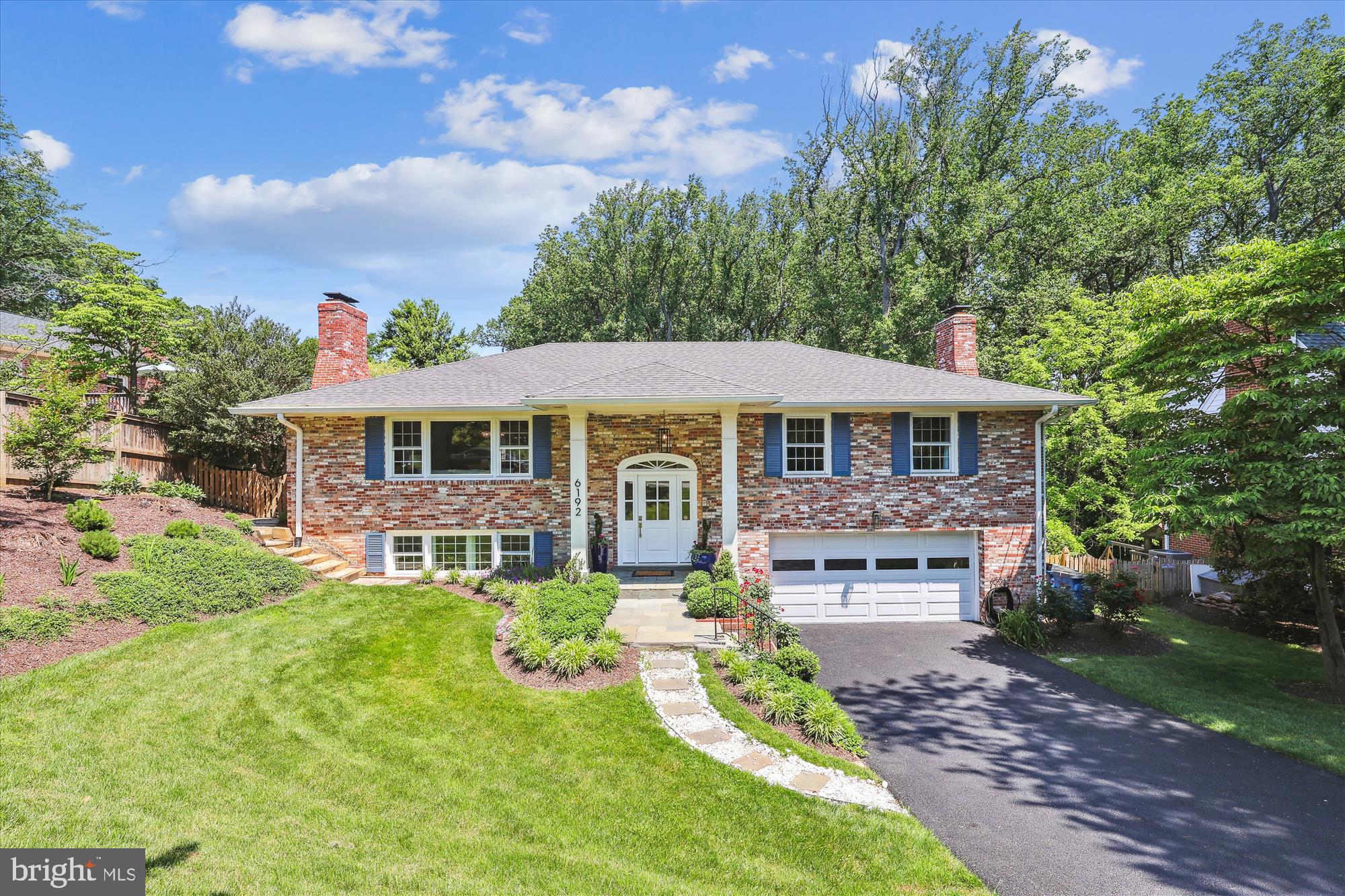 *OPEN SAT 6/1 and SUN 6/2 from 2-4pm!!*  *ABSOLUTELY STUNNING* 5BR/3BA home in sought-after Potomac Hills!  Step inside the light and airy foyer to discover tastefully updated modern features with an open floorplan in the living, kitchen, and dining areas of this beautiful home. The main level features a fabulous over-sized island kitchen, with high-end stainless-steel appliances including built-in drawer microwave, quartz countertops, a stylish mosaic glass backsplash and a farmhouse sink. Warm hardwood flooring and a wood-burning fireplace welcomes you with natural light flowing into the living, kitchen and dining rooms. Living and dining rooms feature custom, linen window treatments.  From the dining room, walk out to the lovely private sunroom overlooking the lush greenery in the backyard. Completing this level is the primary owner suite and two additional spacious bedrooms and two updated bathrooms.  Descend to the lower level and relax in the spacious family room with a wood burning fireplace. This level has two bedrooms, one could be used for an office area, both with access to the backyard. Beautiful, modern full-size bath on this level.  This home is meticulously maintained and it shows!  Large, two-space garage and separate area for laundry and storage. Nestled back on the lot with a lovely gated side path to the magnificent, landscaped, fenced backyard with firepit area and covered patio area. The lush greenery features seasonal perennials and bulbs throughout, and the quiet undeveloped woods of Pimmit Run Trail. Updates include new  roof, gutters, and French drains.  Conveniently located to GW parkway, Tysons, and major commuter routes and short walk to Highland’s Swim and Tennis Club.  Chesterbrook, Longfellow and McLean Schools!