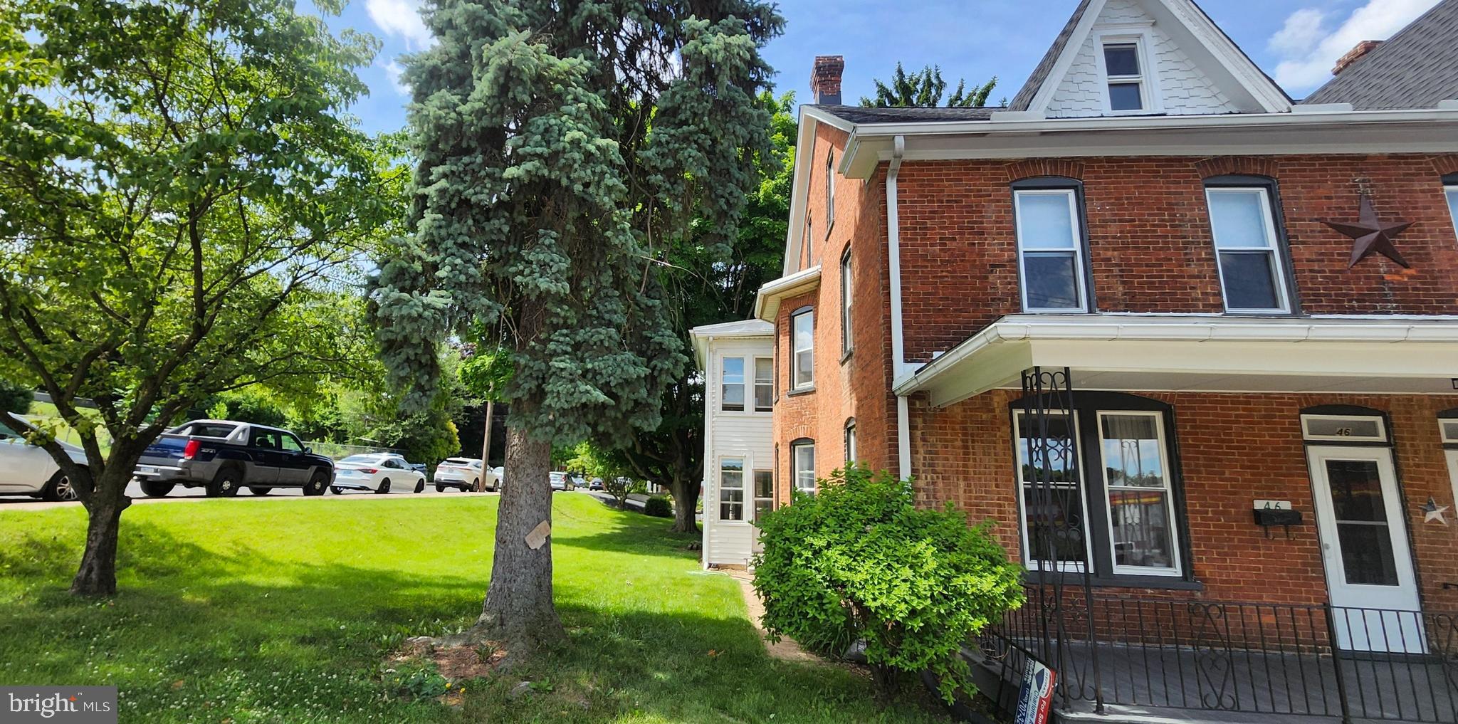 This beautifully updated brick home combines timeless character with modern upgrades throughout. Offering 4 bedrooms, 1 bath, and a versatile side addition featuring two extra rooms. We are counting the upstairs room as a bedroom and  there's plenty of space for a home office, playroom, hobby area, or guest accommodations on the main floor room.
Recent improvements provide peace of mind, including a new roof (with Warranty) , new vinyl windows, new 200-amp electrical service and wiring, and a new heat pump with oil backup and central air. Inside, you'll find freshly sanded and refinished hardwood floors, updated lighting throughout, and a partially renovated kitchen and bath. The kitchen features granite countertops, and new appliances including refrigerator, dishwasher, microwave and washer/dryer combo.
The full attic and basement offer excellent storage and future finishing potential. Enjoy relaxing on the covered porches and take advantage of the detached single-car garage. Situated on a spacious corner lot, the property offers generous side and backyard space for outdoor enjoyment, gardening, or entertaining.
Conveniently located within easy walking distance of Historic Downtown Waynesboro, you'll enjoy quick access to local restaurants, boutiques, art galleries, breweries, antique shops, parks, and year-round community events. This move-in-ready home is a wonderful opportunity to enjoy both comfort and convenience in a desirable location.