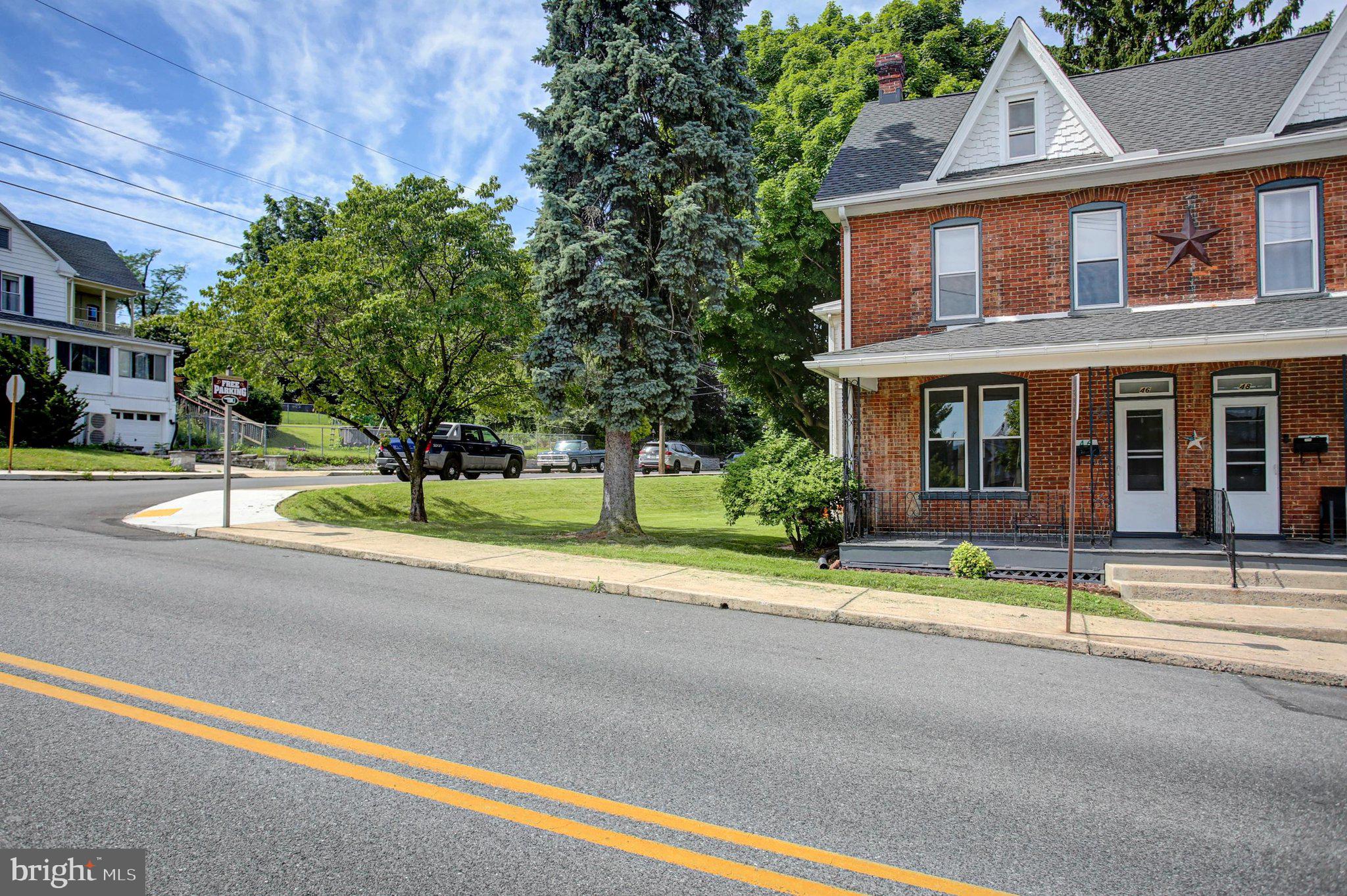 This beautifully updated brick home combines timeless character with modern upgrades throughout. Offering 4 bedrooms, 1 bath, and a versatile side addition featuring two extra rooms. We are counting the upstairs room as a bedroom and  there's plenty of space for a home office, playroom, hobby area, or guest accommodations on the main floor room.
Recent improvements provide peace of mind, including a new roof (with Warranty) , new vinyl windows, new 200-amp electrical service and wiring, and a new heat pump with oil backup and central air. Inside, you'll find freshly sanded and refinished hardwood floors, updated lighting throughout, and a partially renovated kitchen and bath. The kitchen features granite countertops, and new appliances including refrigerator, dishwasher, microwave and washer/dryer combo.
The full attic and basement offer excellent storage and future finishing potential. Enjoy relaxing on the covered porches and take advantage of the detached single-car garage. Situated on a spacious corner lot, the property offers generous side and backyard space for outdoor enjoyment, gardening, or entertaining.
Conveniently located within easy walking distance of Historic Downtown Waynesboro, you'll enjoy quick access to local restaurants, boutiques, art galleries, breweries, antique shops, parks, and year-round community events. This move-in-ready home is a wonderful opportunity to enjoy both comfort and convenience in a desirable location.