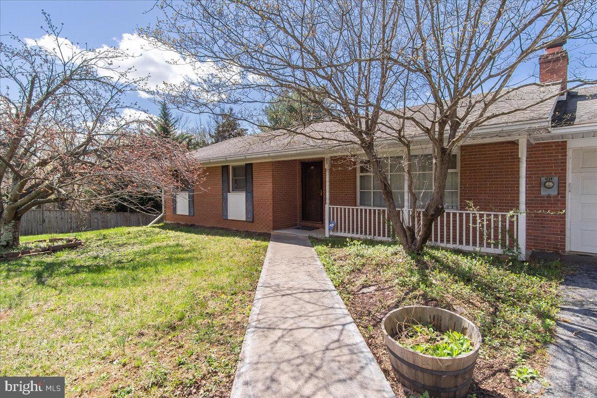 This country rancher is featured on a nice large lot/huge backyard, fenced, and with a massive greenhouse - a true gardener's dream!     Inside main level features 2-3 bedrooms (wall removed between 2 bedrooms but easy to go back to 3), a large full bathroom, living room with fireplace, remodeled kitchen, dining area off kitchen, and doors/exits to garage and basement;  Basement has one large finished space, laundry, and another full bathroom.   Mostly hardwood flooring throughout the main level.   Large deck on back to overlook the property.   The greenhouse actually stills has a small pool under the floor if you'd rather skip the gardening and turn the structure back into a swim/workout facility as it was prior.  Get your toured scheduled ASAP - this is priced to sell quickly.   Strictly AS IS.   POA selling for owner.